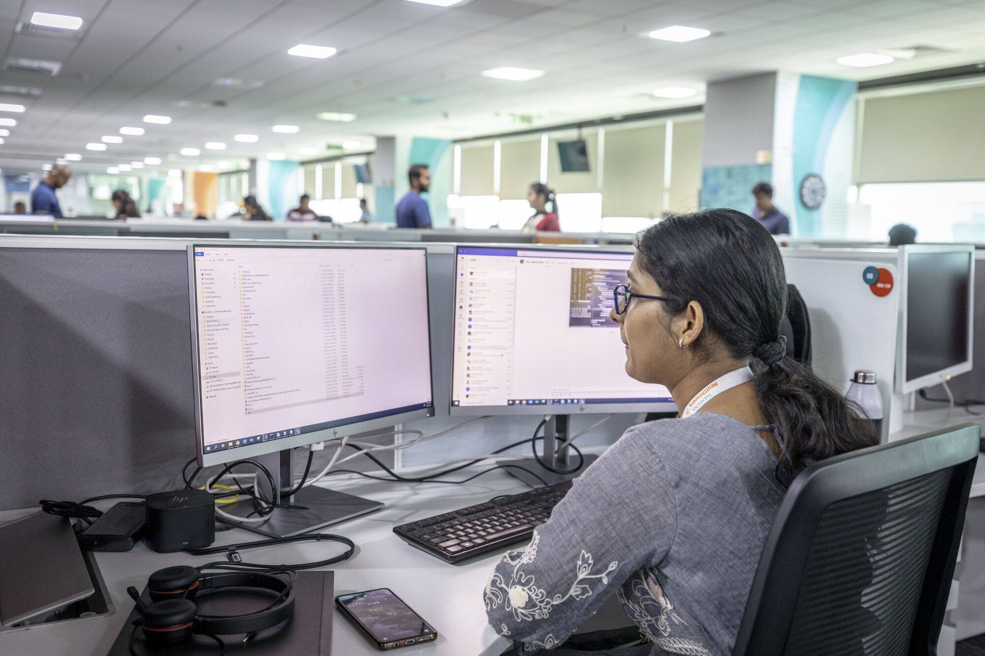 Workers are seen at the Siemens Healthineers AG global capability centre in Bangalore earlier this year. Across India, the offices set up by multinationals to provide cheap operational support are now taking on more sophisticated roles. Photo: Bloomberg