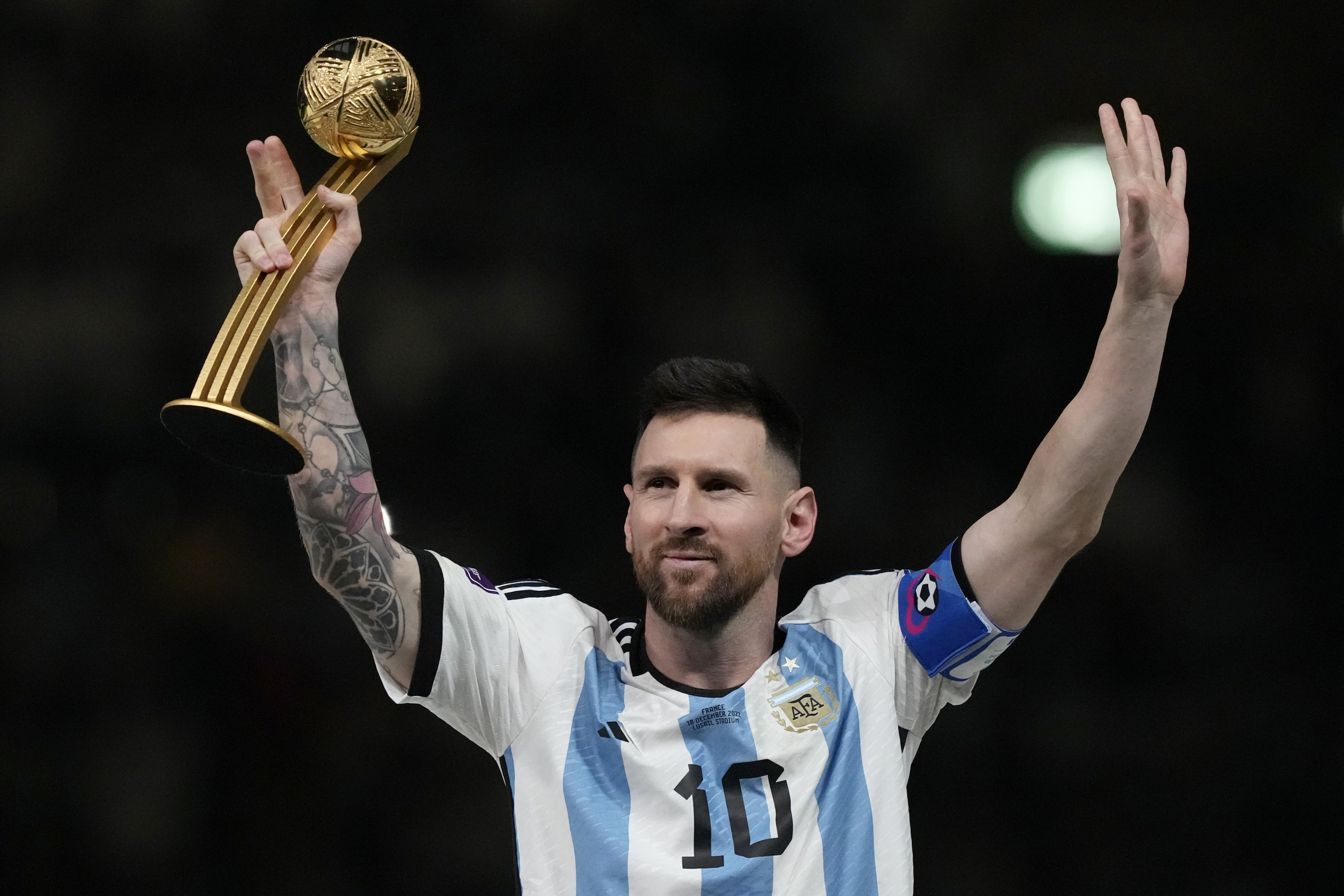 Argentina’s Lionel Messi waves after receiving the Golden Ball award for best player at the end of the World Cup finals against France in Lusail, Qatar, in December 2022. Photo: AP Photo