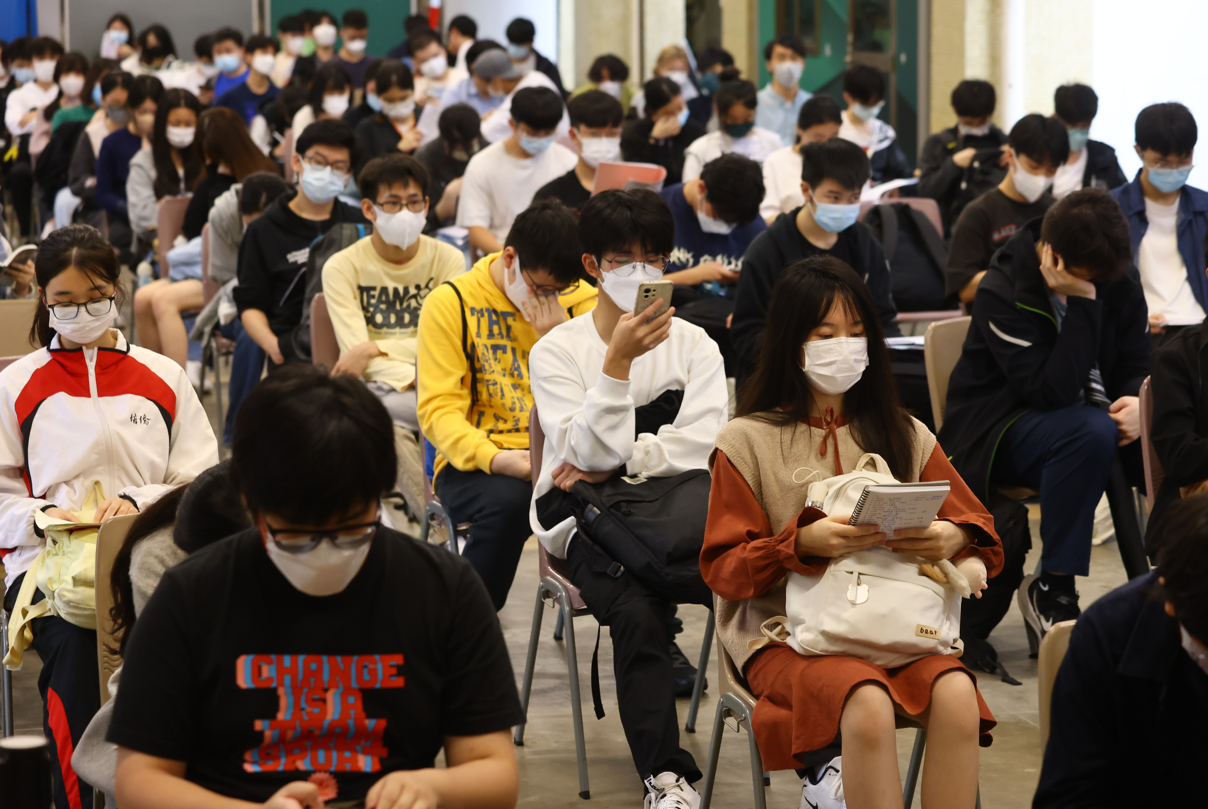 Students wait to take a paper on the first day of the Hong Kong Diploma of Secondary Education exams on April 21, at  a school in Hong Kong’s North Point district. Photo: Dickson Lee