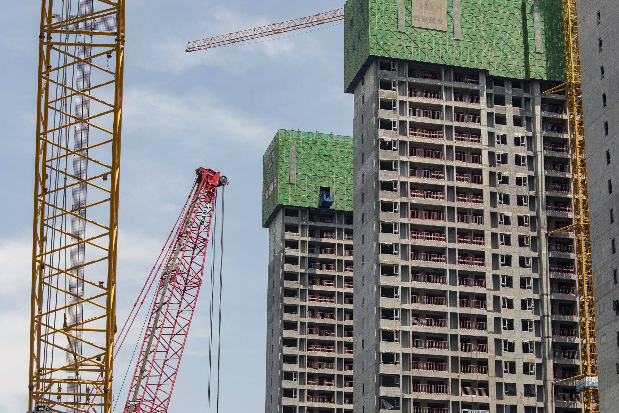 Residential buildings under construction in Zhengzhou, Henan province, China. Photo: Bloomberg