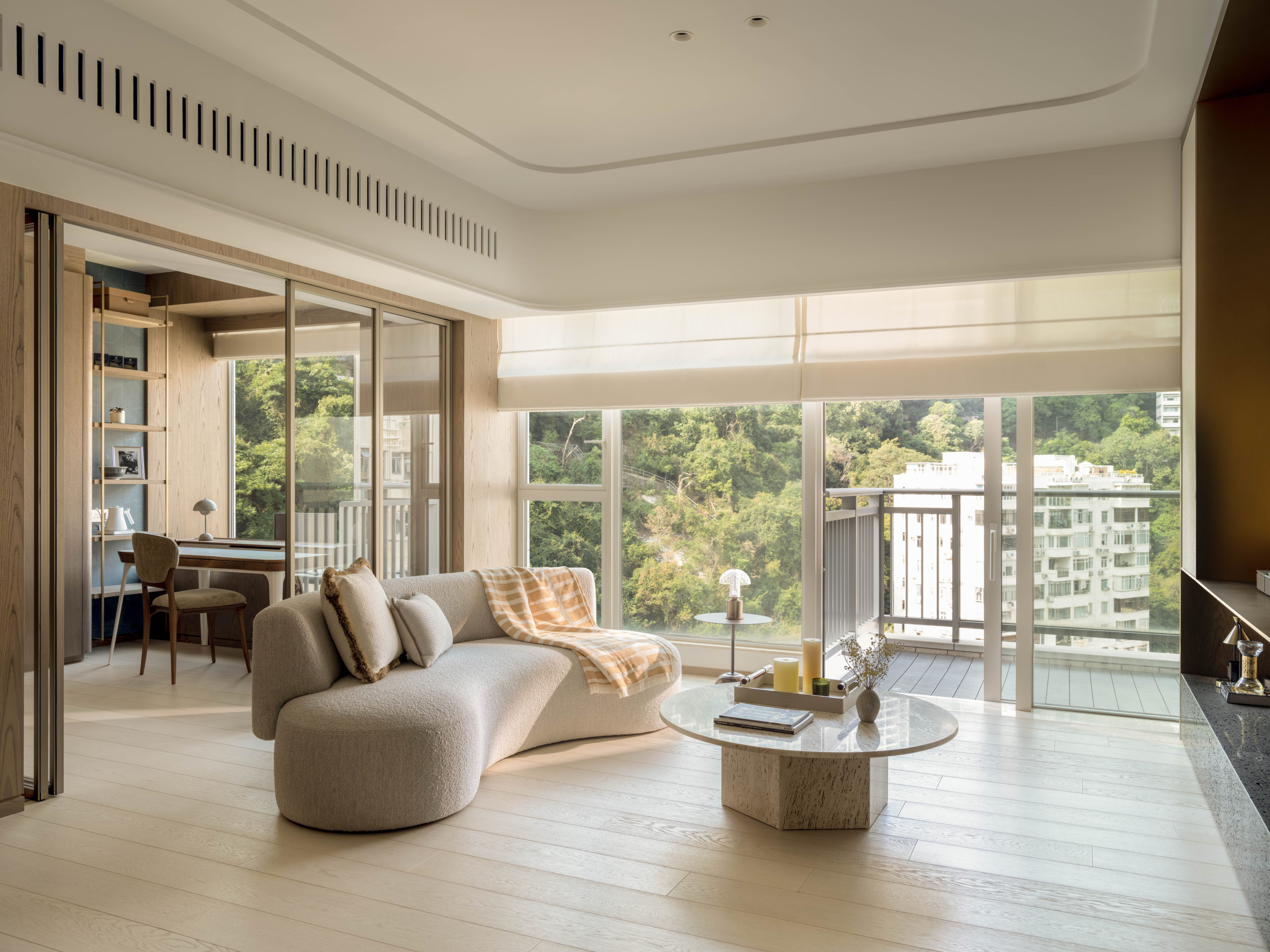 The living room of a Happy Valley flat designed by Studiossoo. The home was given a high-end renovation for a pair of newlyweds with a taste for all things opulent. Photo: Lit Ma/Common Studio