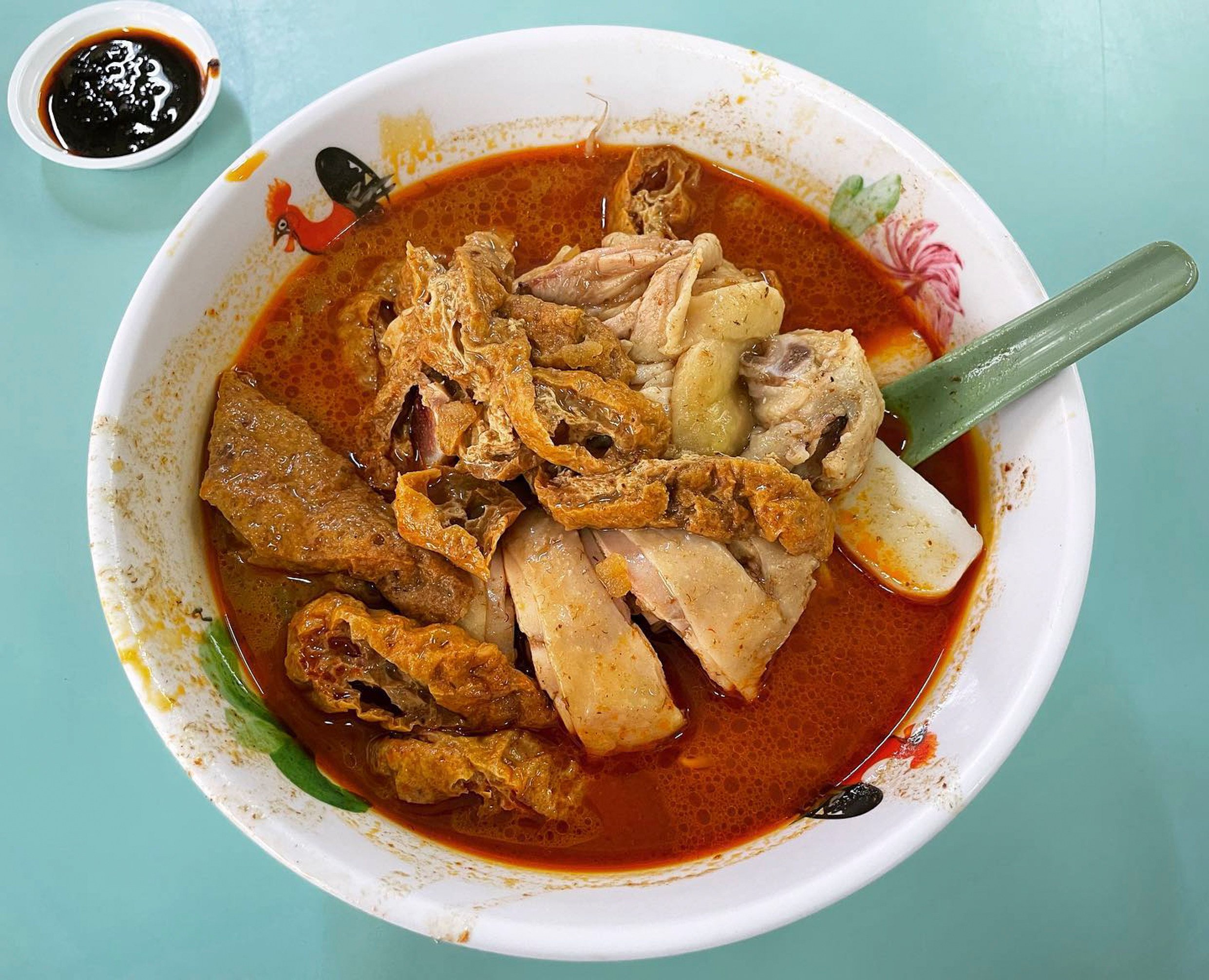 Chicken curry noodles from Hong Lim Market & Food Centre’s Heng Kee. It is one of 17 hawker stalls that have been newly awarded a Bib Gourmand in the Michelin Guide Singapore 2023. Photo: Instagram/@lordq14