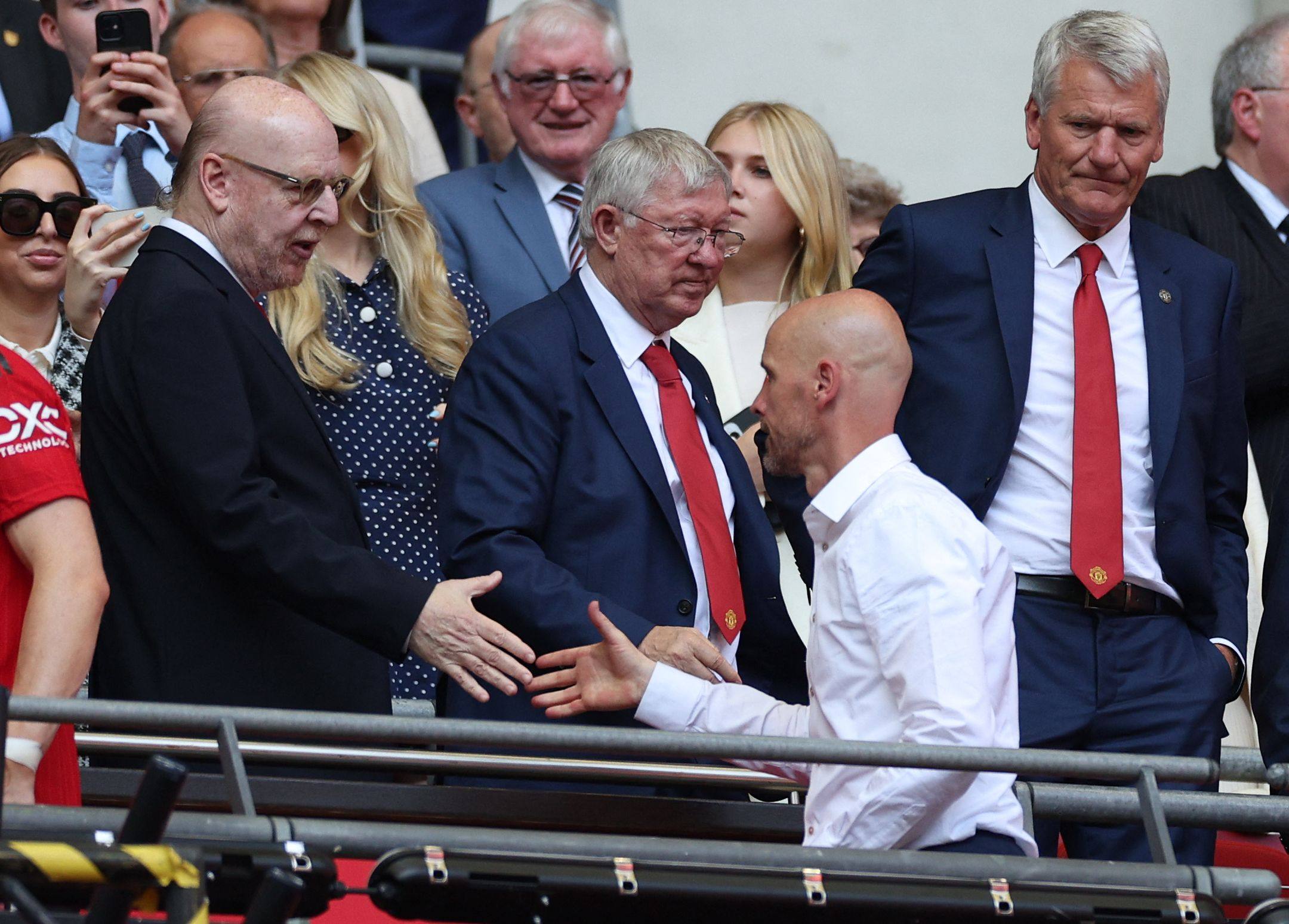 Manchester United co-owner Avram Glazer (left), former manager Sir Alex Ferguson and ex-chief executive David Gill shake hands with manager Erik ten Hag after the English FA Cup final loss to Manchester City at Wembley Stadium in London on June 3. Photo: AFP