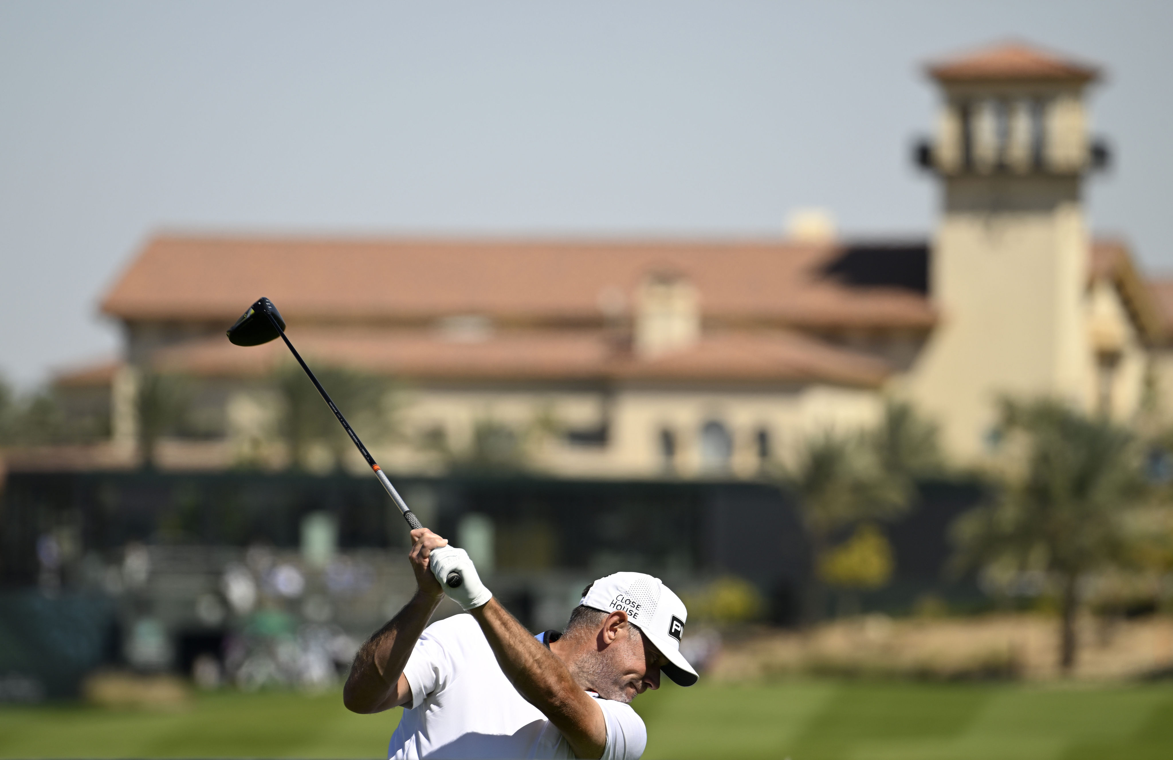 Lee Westwood hits a tee-shot during February’s PIF Saudi International event at Royal Greens Golf & Country Club. Photo: Asian Tour