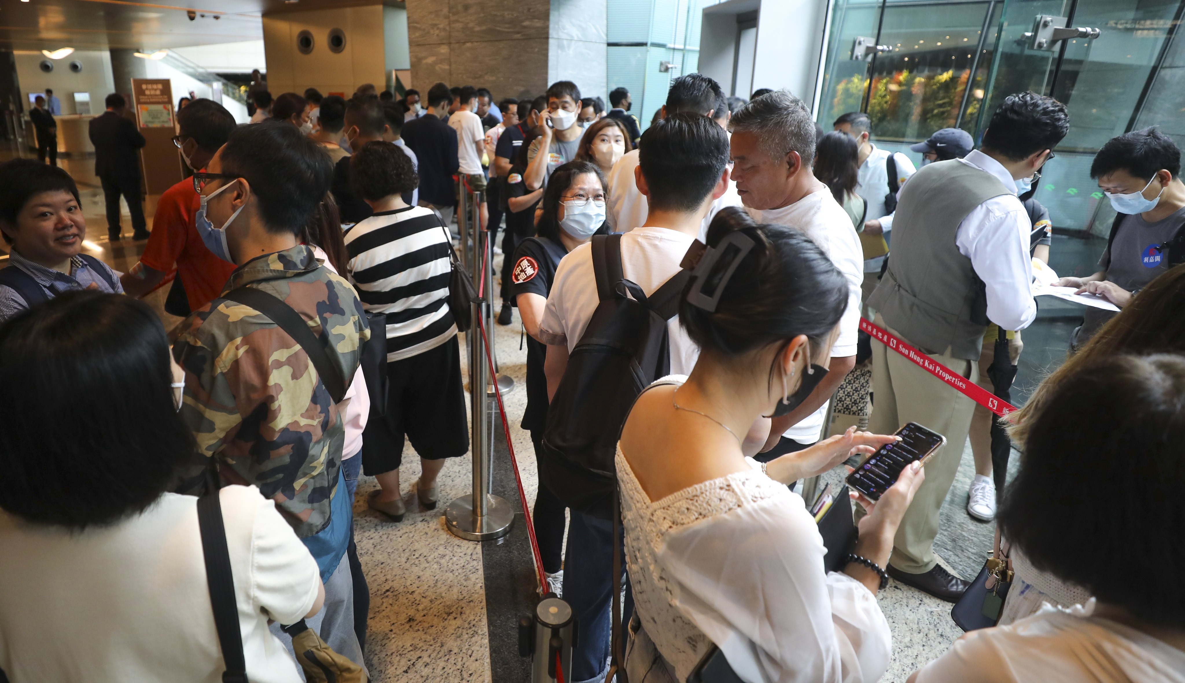 People queued for Phase 2A of the Novo Land project in Tuen Mun at Sun Hung Kai Properties’ sales office in Kowloon on 17 June 2023. Photo: Xiaomei Chen