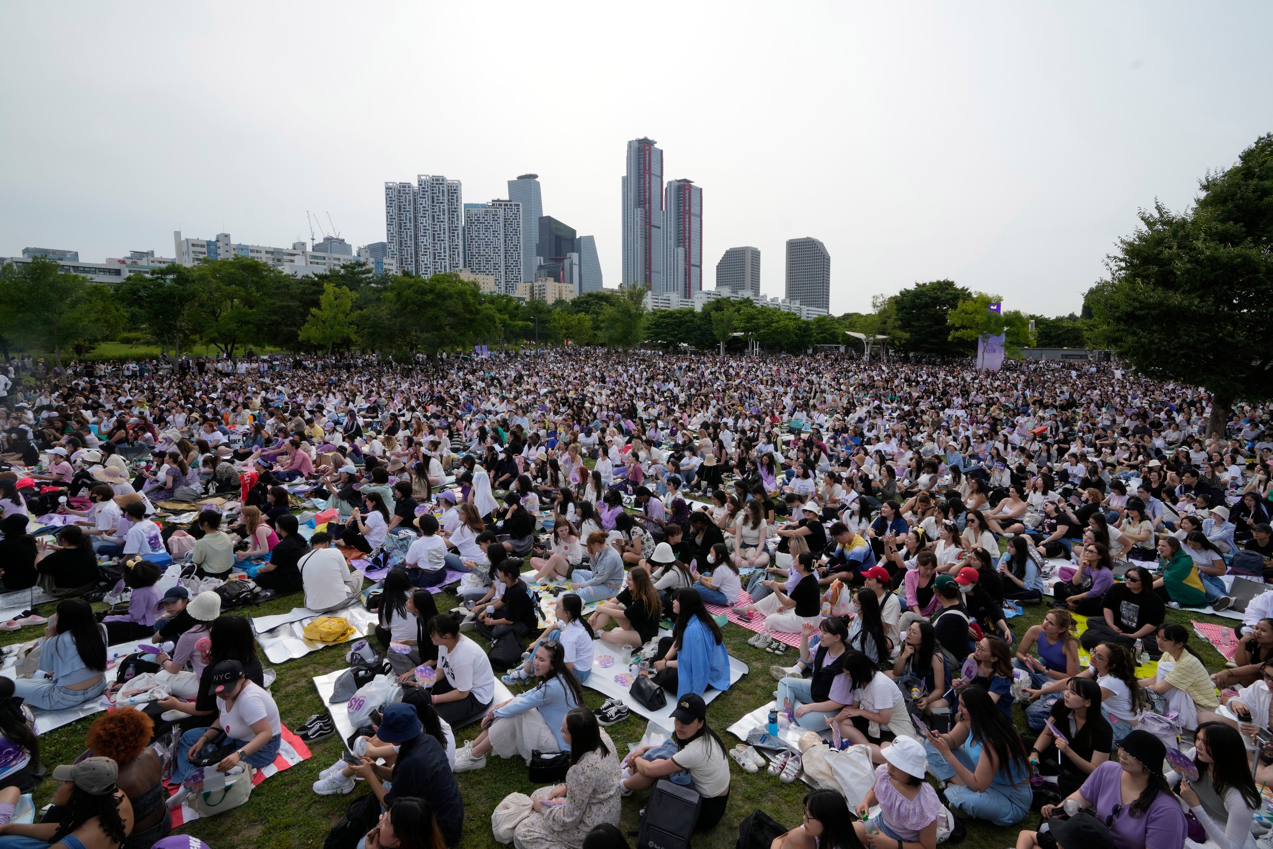 Fans of BTS gather at a park near the Han River in Seoul, South Korea, during an event to celebrate the 10th anniversary of the K-pop band. Photo: APS
