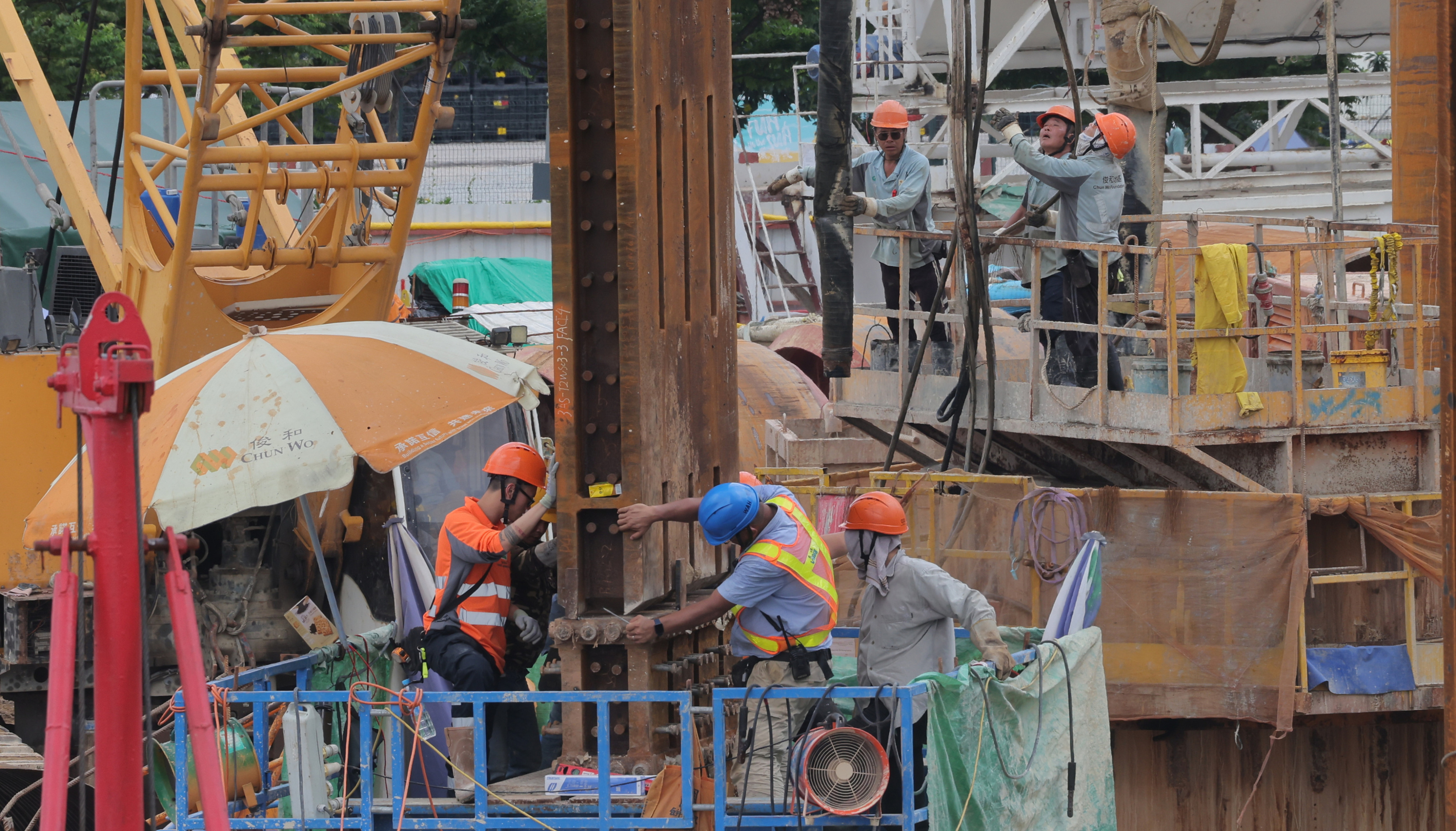 Workers at a construction site in Central on June 13. The construction sector, like others, is suffering from a shortage of labour. Photo: Jelly Tse