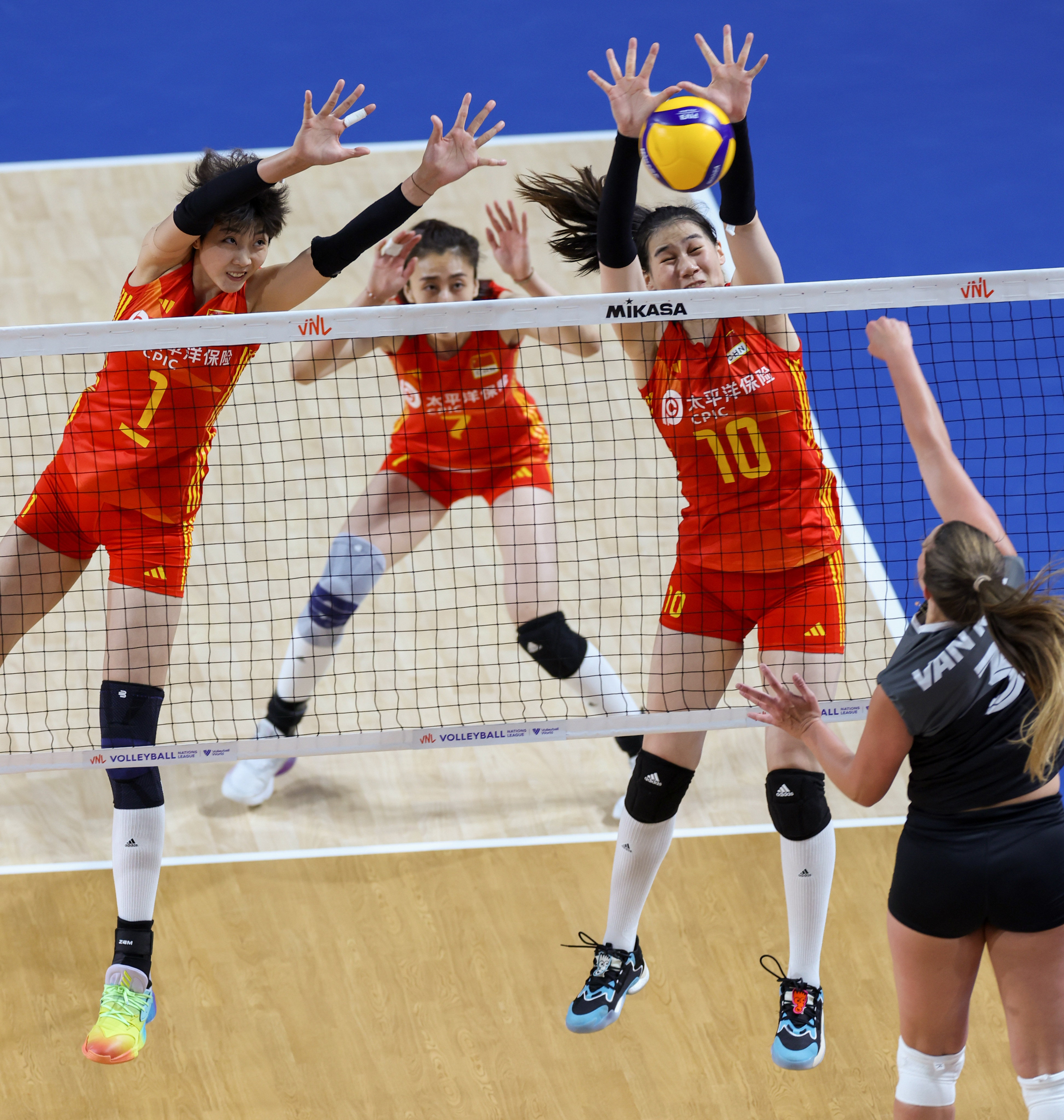 China’s Yuan Xinyue, Wang Yuanyuan and Wang Yunlu in action during their FIVB Women’s Volleyball Nations League game against Canada at the Hong Kong Coliseum. Photo: Yik Yeung-man