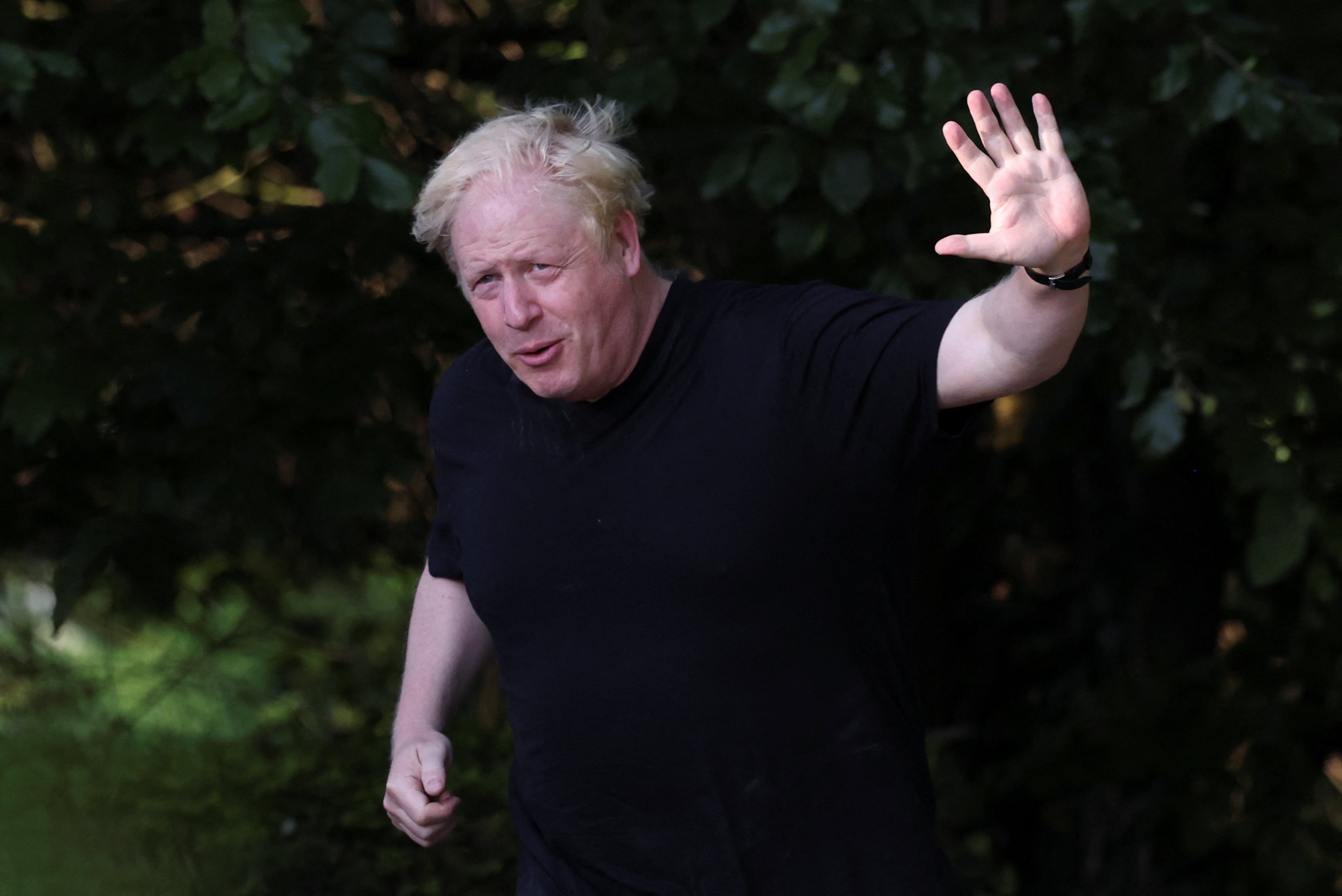 Former British prime minister Boris Johnson running near his home. Photo: Reuters