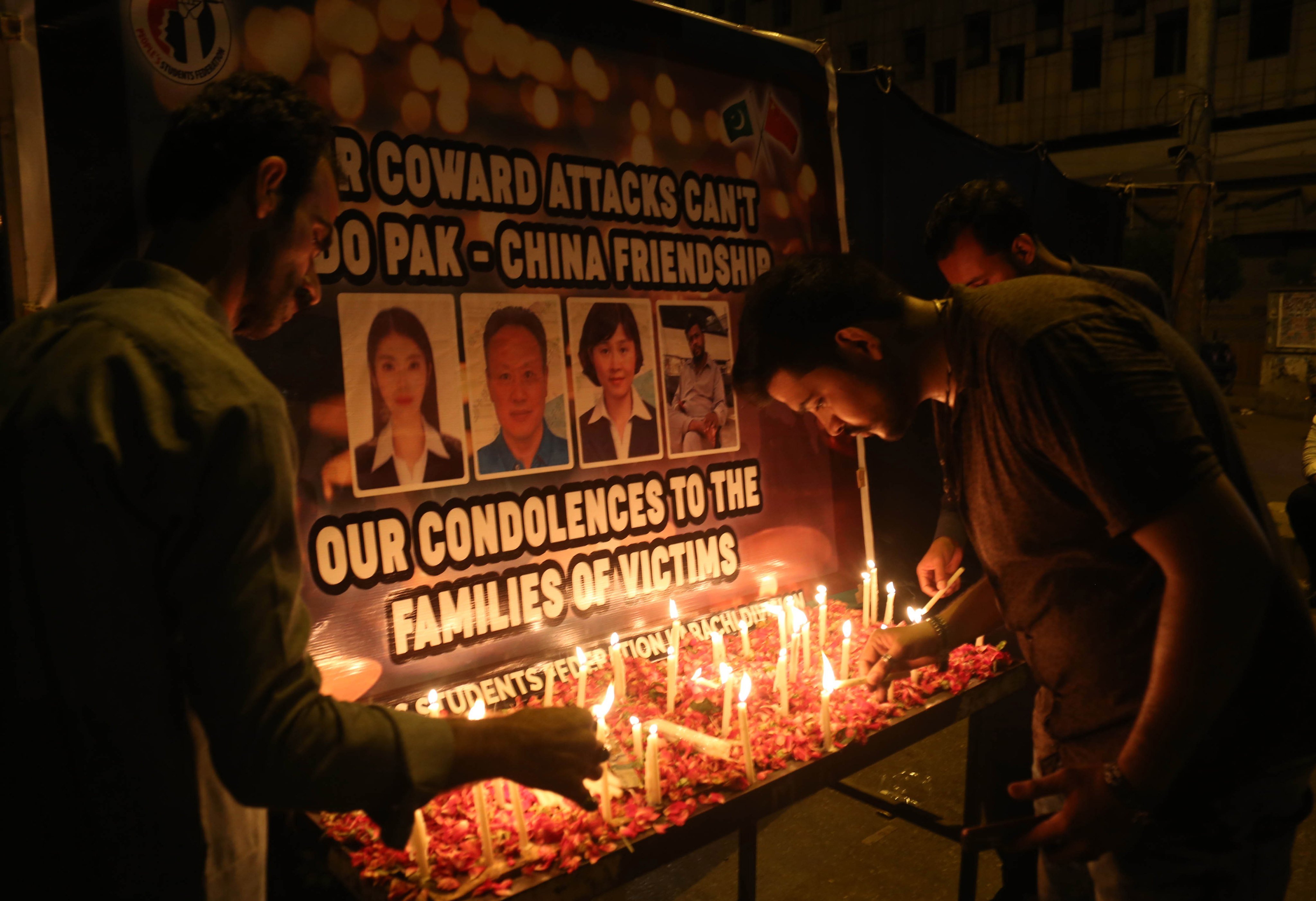 A candle-light vigil in remembrance of the victims of 
a suicide bombing in Karachi in April 2022. Three Chinese    nationals were among the four people killed in the attack claimed by the Baloch Liberation Army. Photo: EPA-EFE