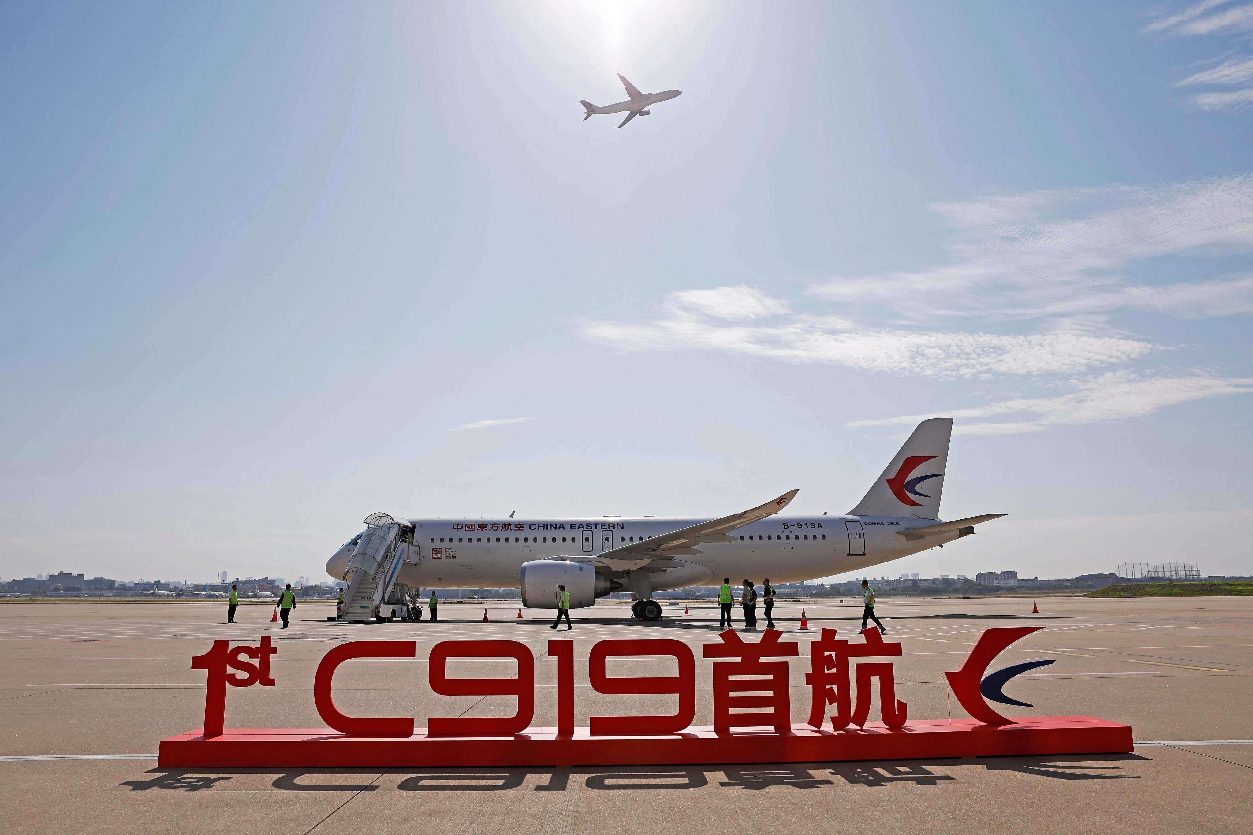 China’s first domestically produced passenger jet, the C919, is seen before a flight from Shanghai to Beijing at Shanghai Hongqiao Airport on May 28. Its first commercial flight was a milestone event in the nation’s decades-long effort to compete with Western rivals in aviation. Photo: AFP