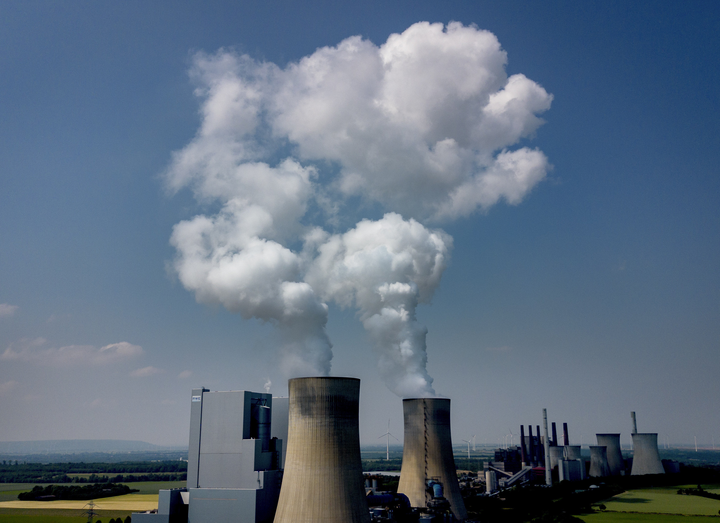 Emissions rise from a coal-fired power plant in Neurath, Germany. The increase in average global temperatures since the advent of industrialisation briefly exceeded 1.5 degrees Celsius in early June. Photo: AP