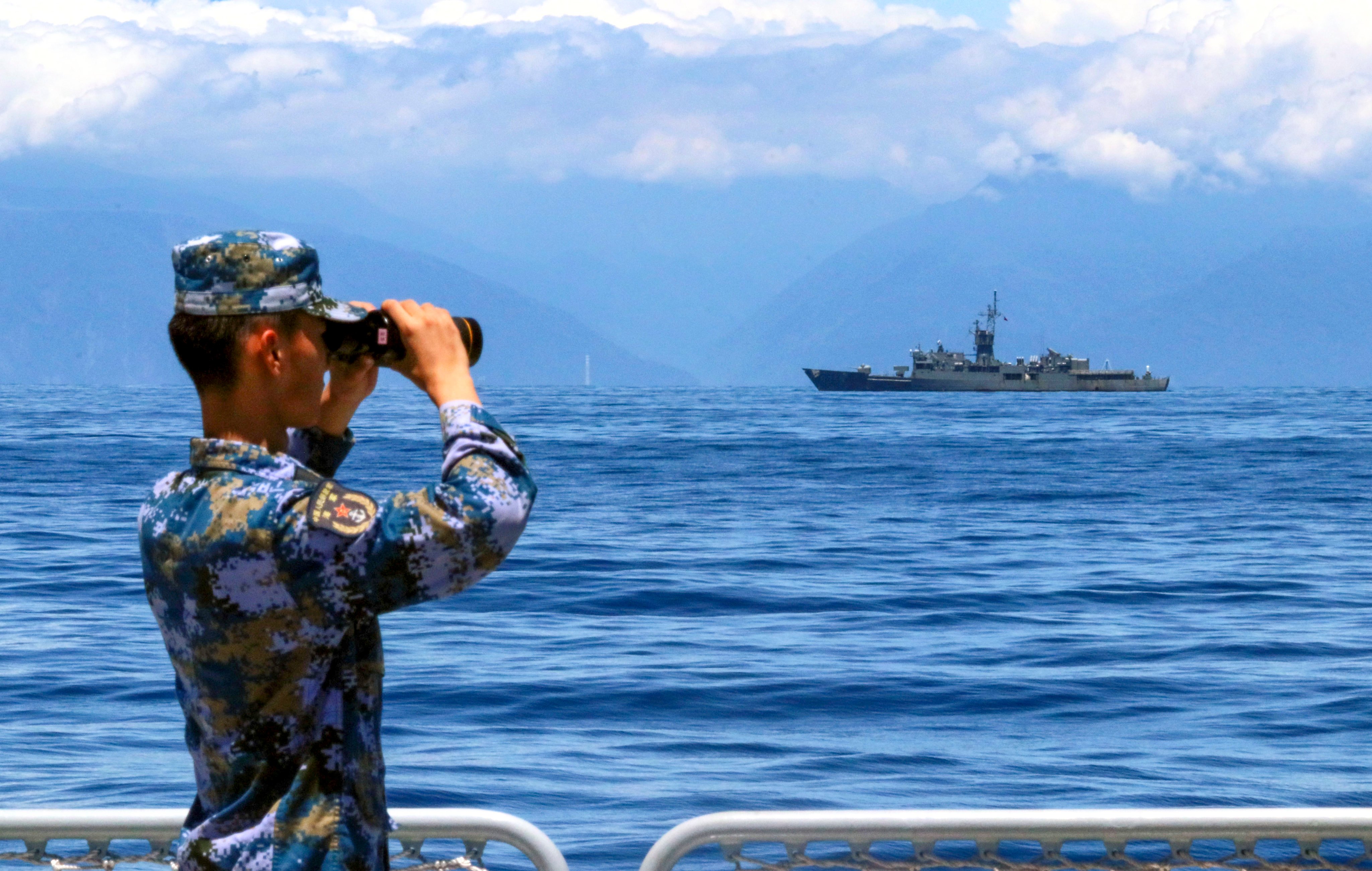 A Chinese serviceman looks through binoculars during combat exercises and naval training drills held in the waters around Taiwan in August last year in response to then-US House Speaker Nancy Pelosi’s visit to the self-ruled island. Photo: Xinhua