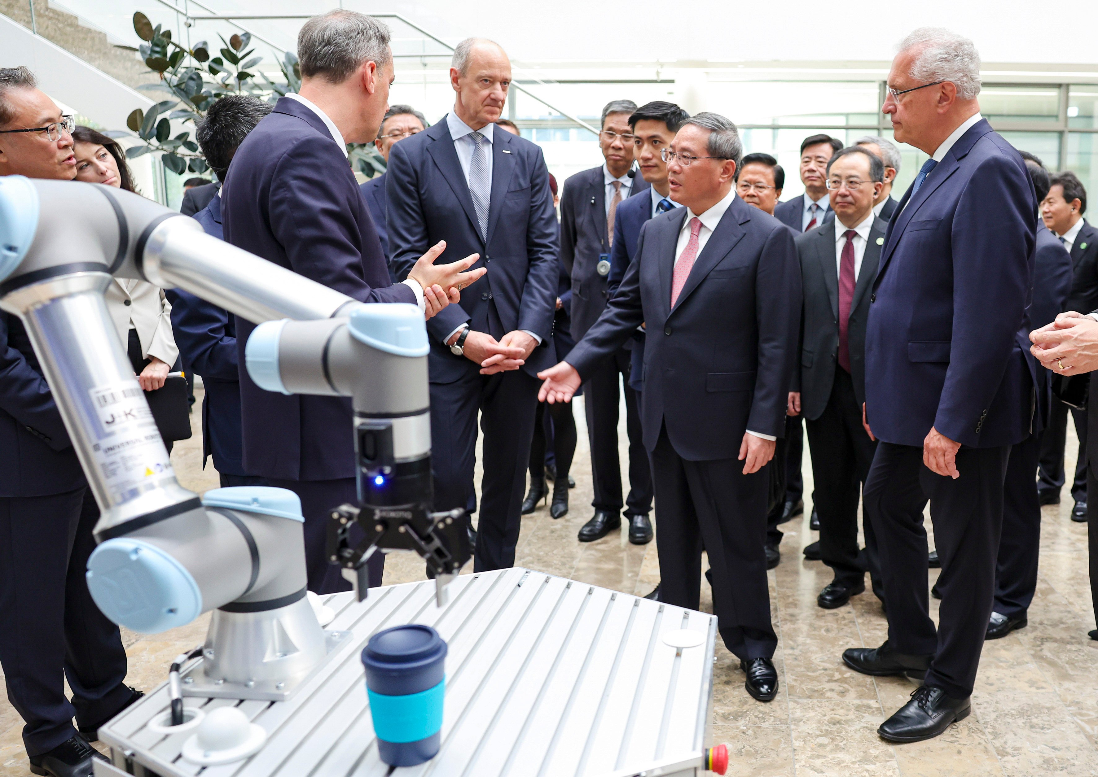 Chinese Premier Li Qiang visits the headquarters of Siemens in Germany’s Bavaria. Li repeated calls for greater “openness and cooperation” throughout his tour. Photo: Xinhua