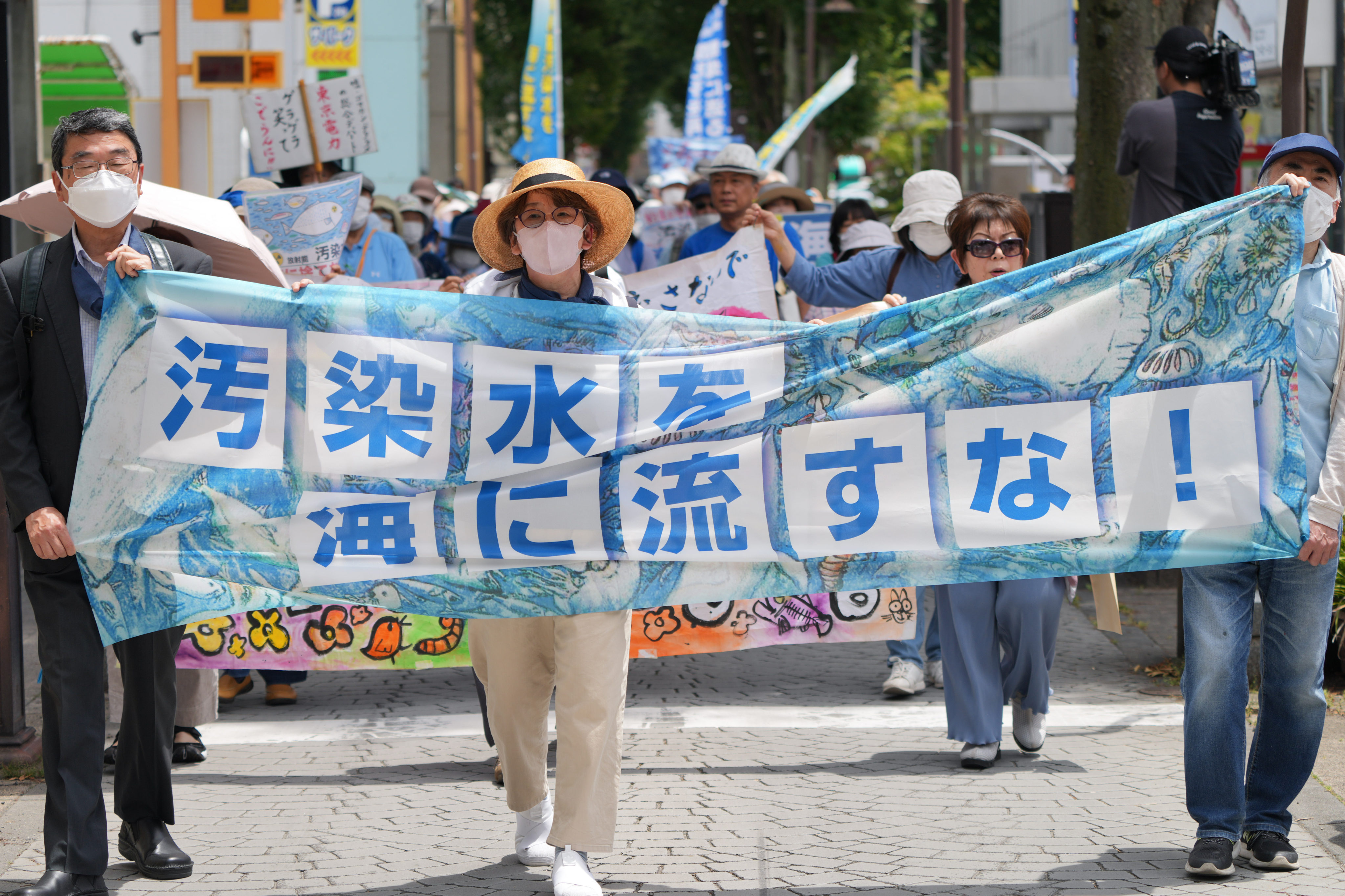 Protesters in Fukushima, Japan rally on June 20 against their government’s plan to discharge treated radioactive waste water into the sea. Photo: Xinhua