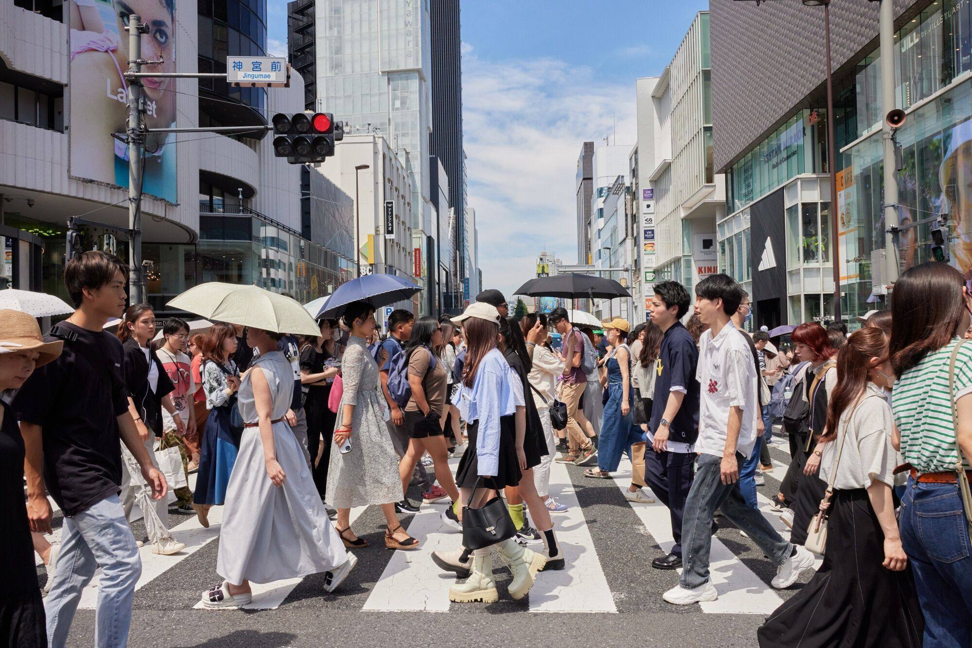 People cross a street in a Tokyo shopping district on Saturday. Roughly 27 million people in Japan are millennials, defined as those born between 1981 to 1996. Photo: Bloomberg