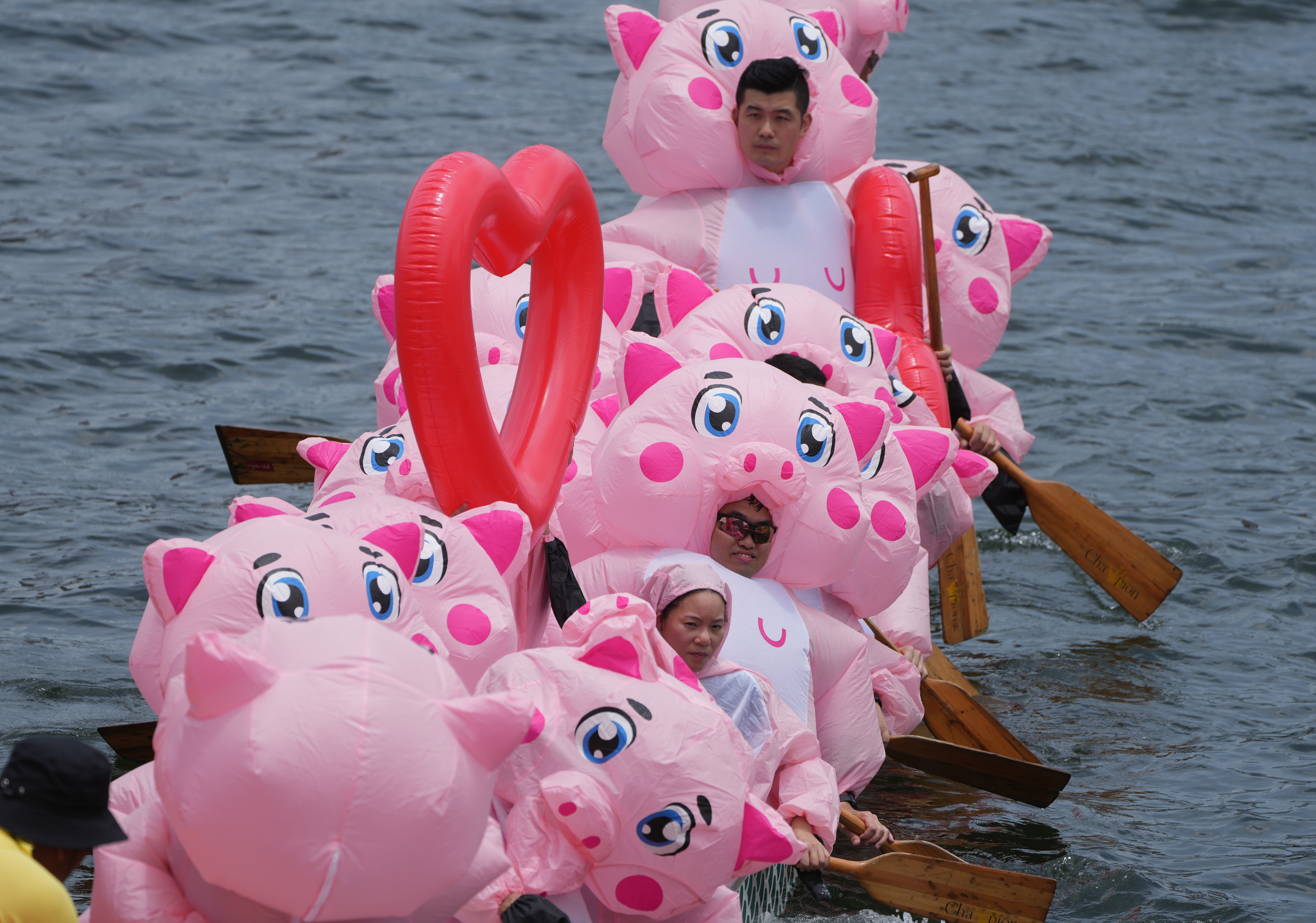 A crew of MTR staff dress up as adorable pigs for the last day of 2023 Hong Kong International Dragon Boat Races. Photo: Sam Tsang