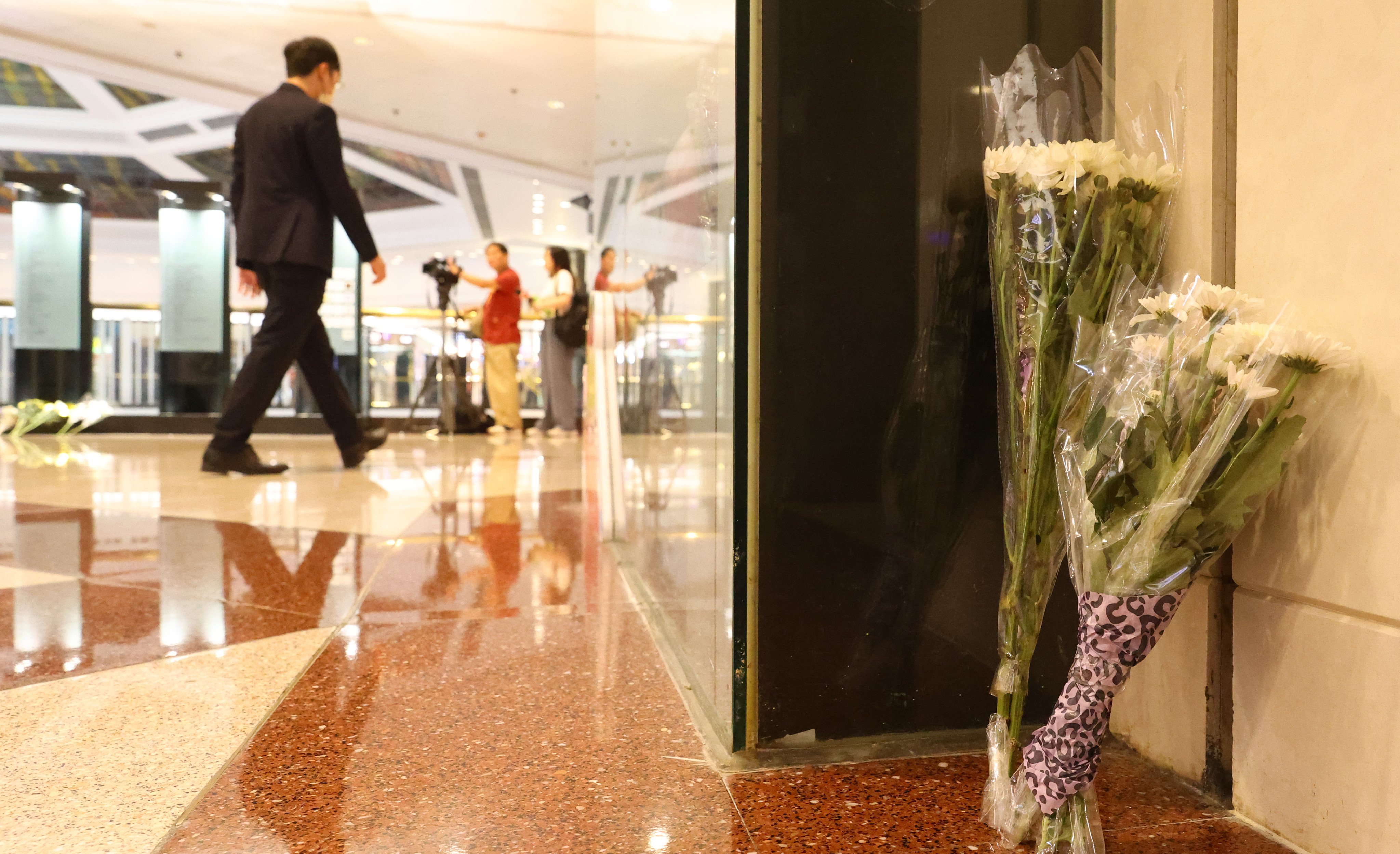 Flowers are seen in Plaza Hollywood, in Diamond Hill, on June 3, after two women were killed in a knife attack. The incident is one in a recent string of violent attacks in Hong Kong. Photo: Dickson Lee