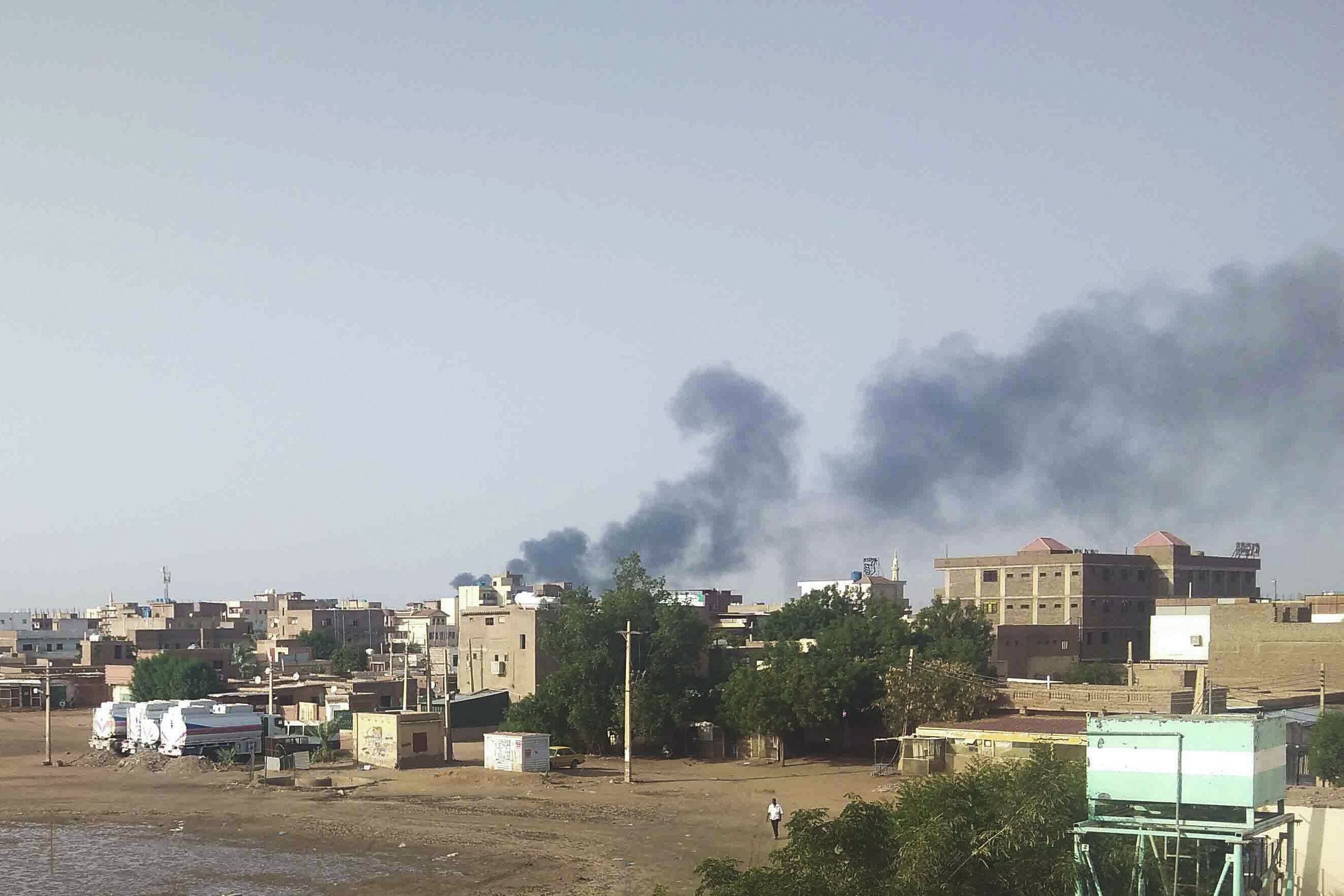 Smoke rises over Khartoum, Sudan on Friday as cashes between warring factions resumed after a three-day cease-fire expired. Photo: AP