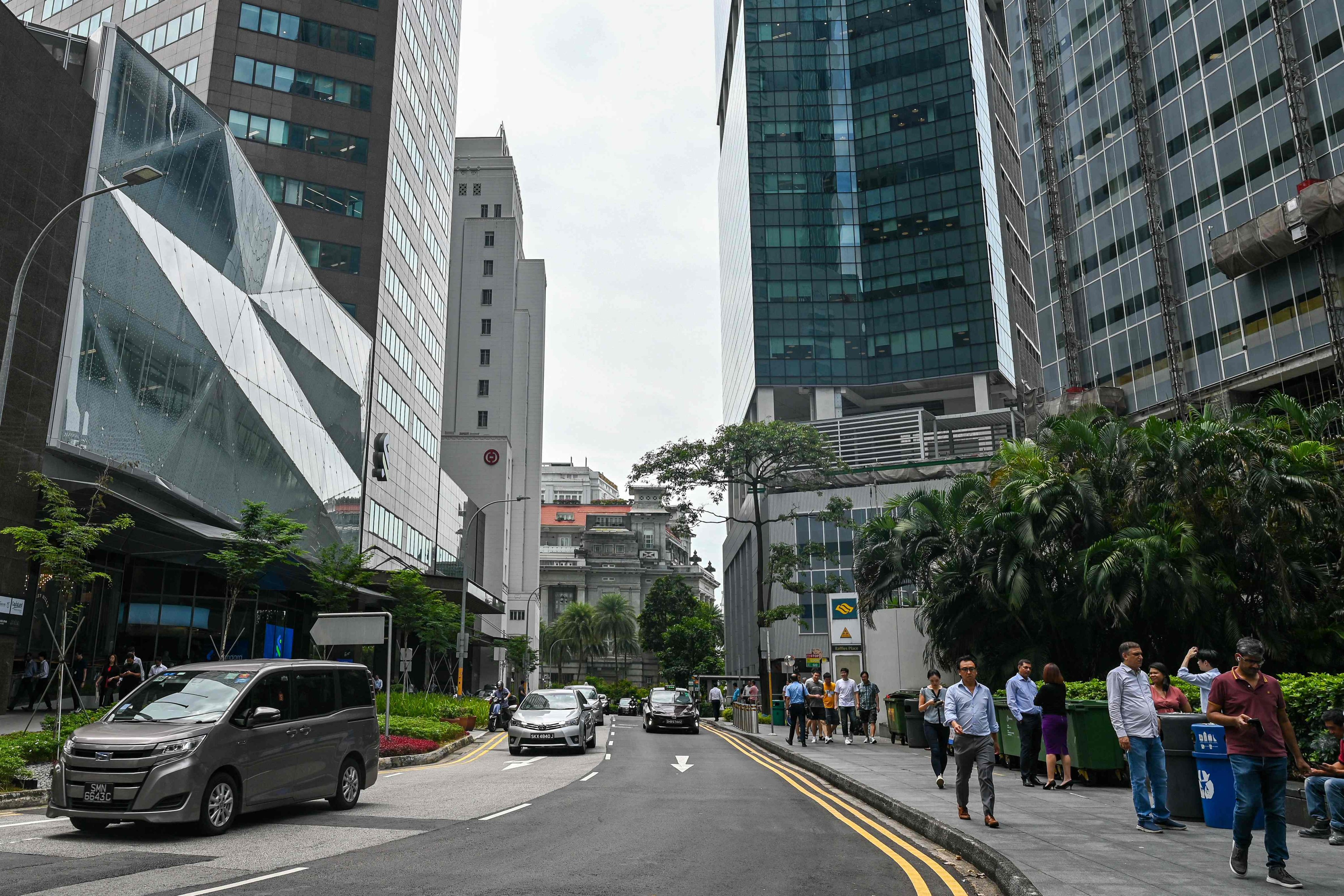Raffles Place financial business district in Singapore. The city state’s electronics industry plunged 23 per cent year on year. Photo: AFP