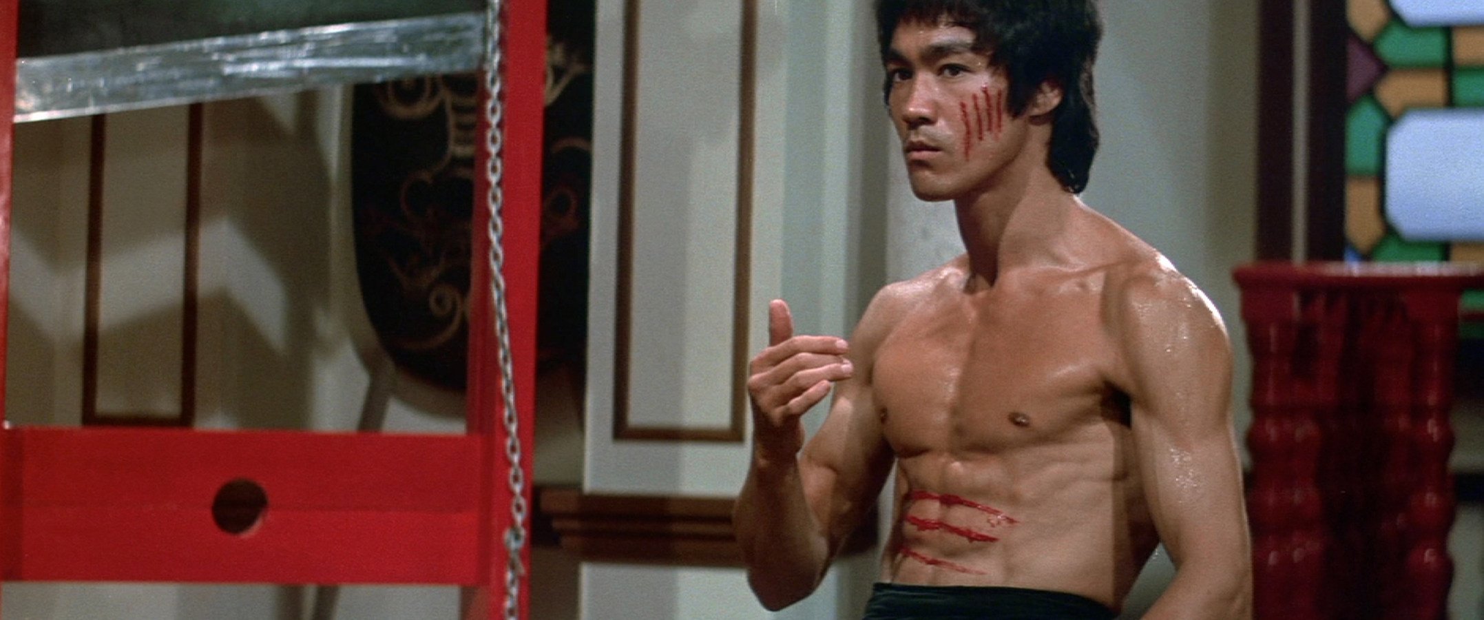 Bruce Lee in a still from “Enter the Dragon”, released a month after his death in 1973. The success of his films led producers to cash in by using lookalike actors. Photo: Criterion Collection