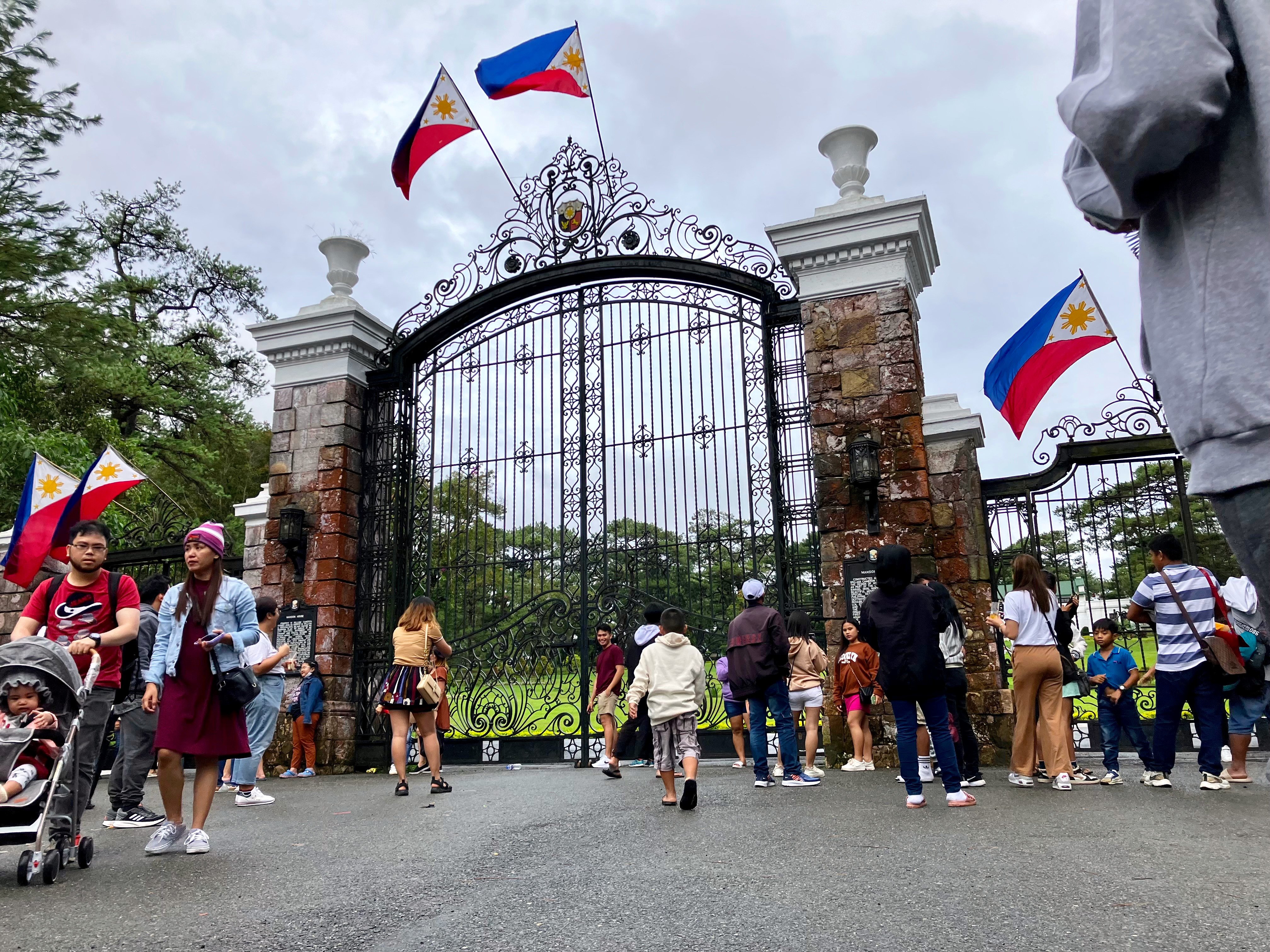 Tourists take pictures outside The Mansion in Baguio, Philippines. Photo: SCMP