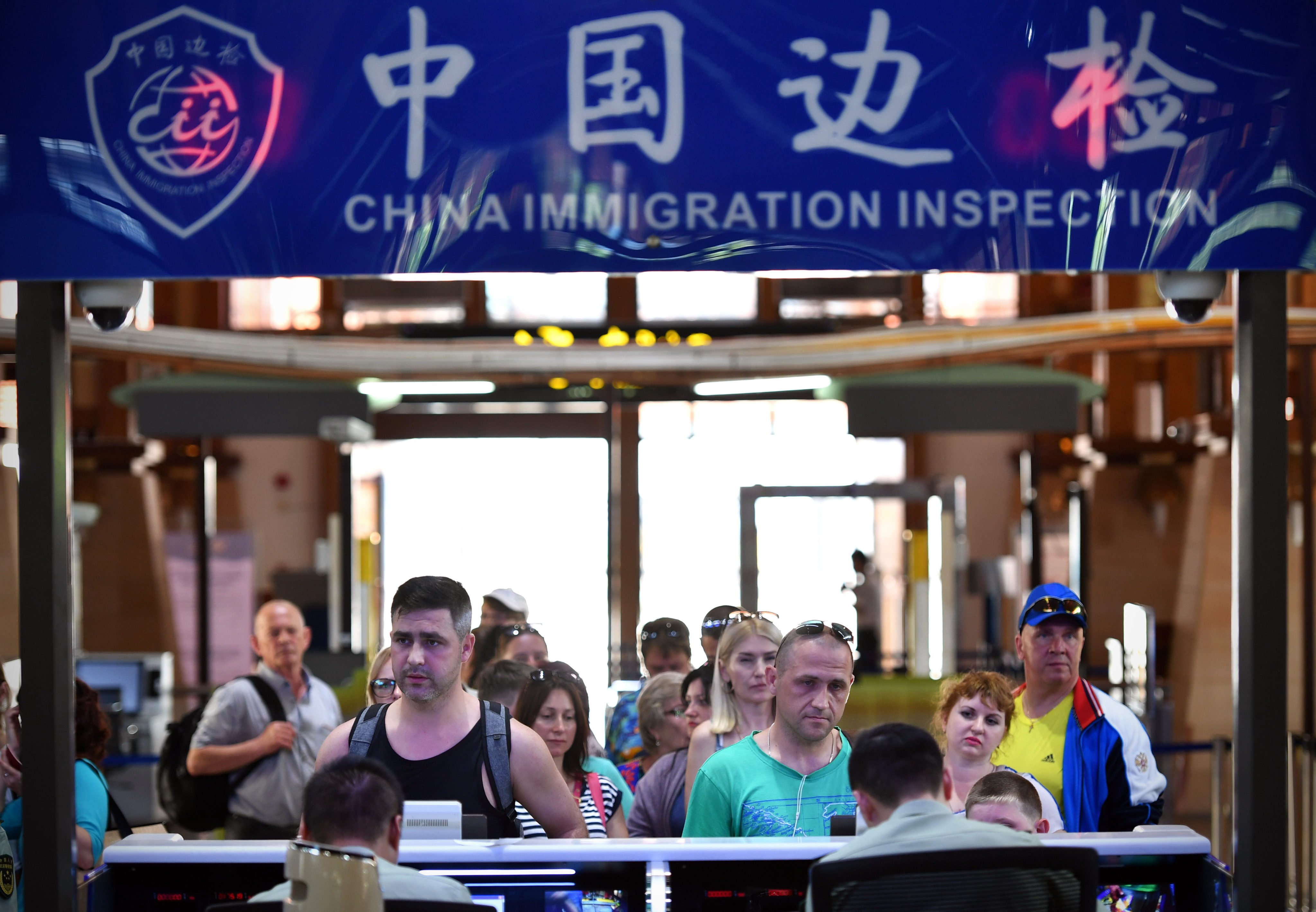 Tourists arrive at the airport in Sanya, south China’s Hainan province, in 2018. Photo: Xinhua