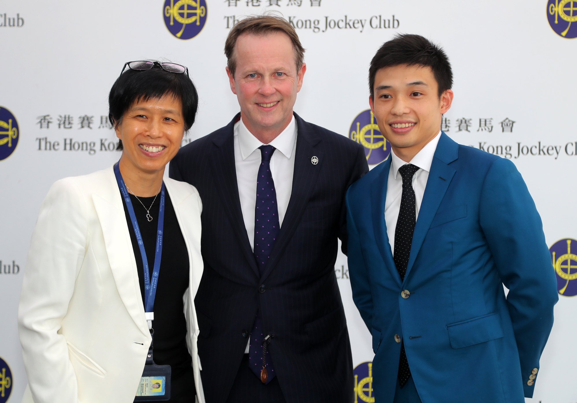 Racing Talent Training Centre executive manager Amy Chan Lim-chee (left), Jockey Club executive director of racing Andrew Harding (centre) and retiring rider Jack Wong at Sha Tin on June 18.
