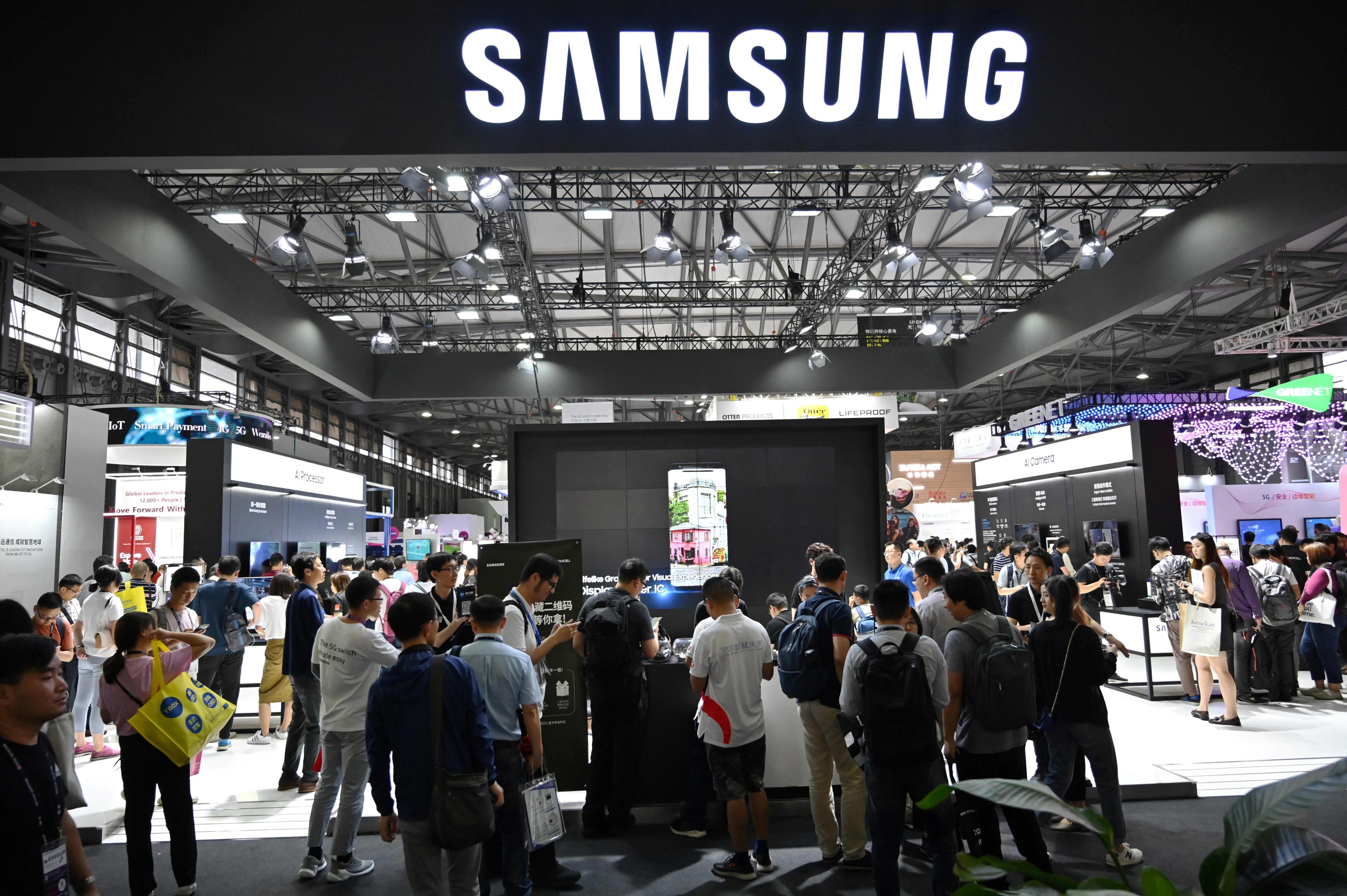 People are seen visiting the Samsung Electronics exhibition area at MWC Shanghai on June 16, 2019. The world’s largest smartphone vendor had been a major exhibitor and corporate sponsor at the annual trade show over the past several years. Photo: Agence France-Presse