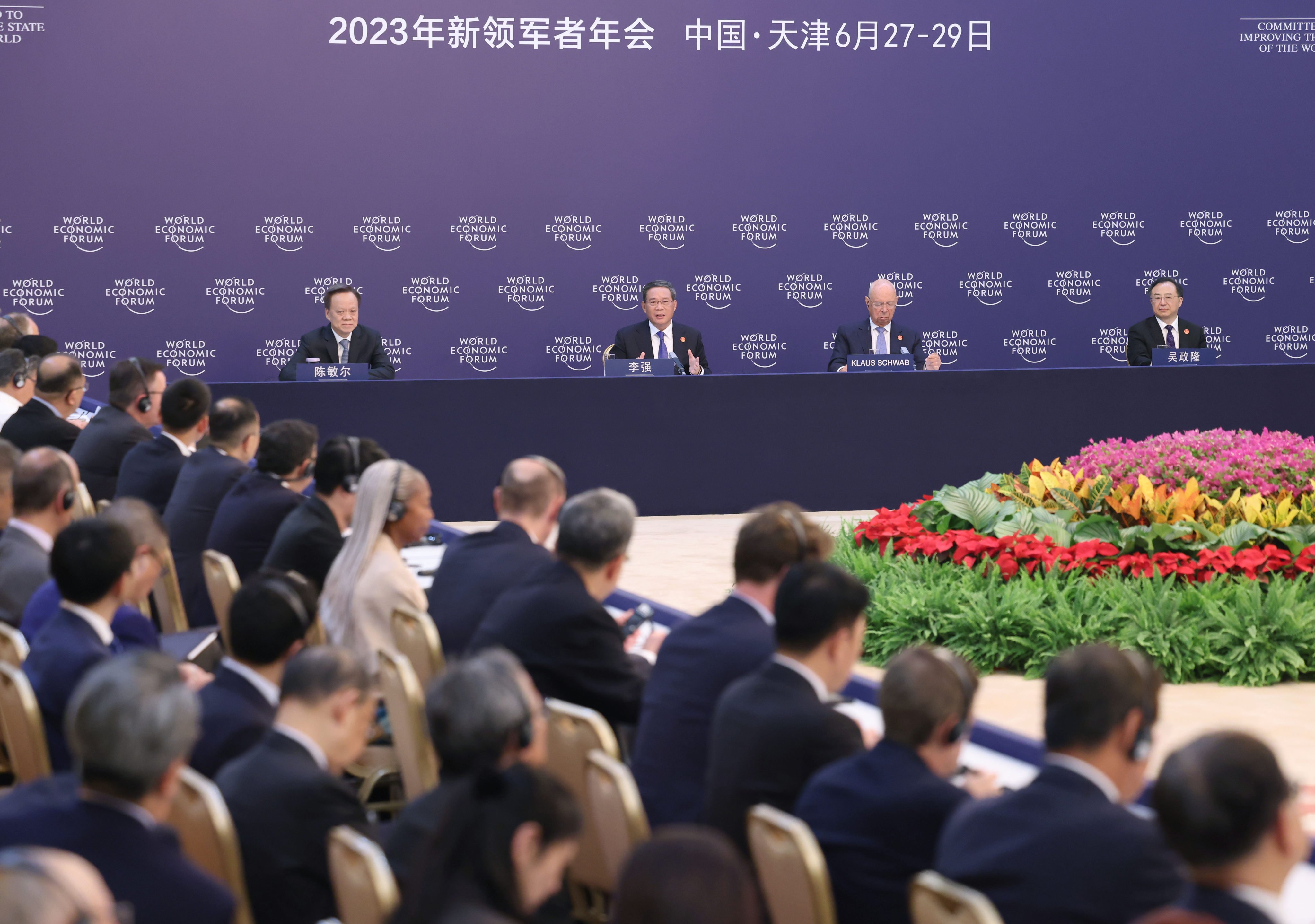 Chinese Premier Li Qiang attends an entrepreneur dialogue and exchanges ideas with entrepreneurs at the 14th Annual Meeting of the New Champions in north China’s Tianjin. Photo: Xinhua