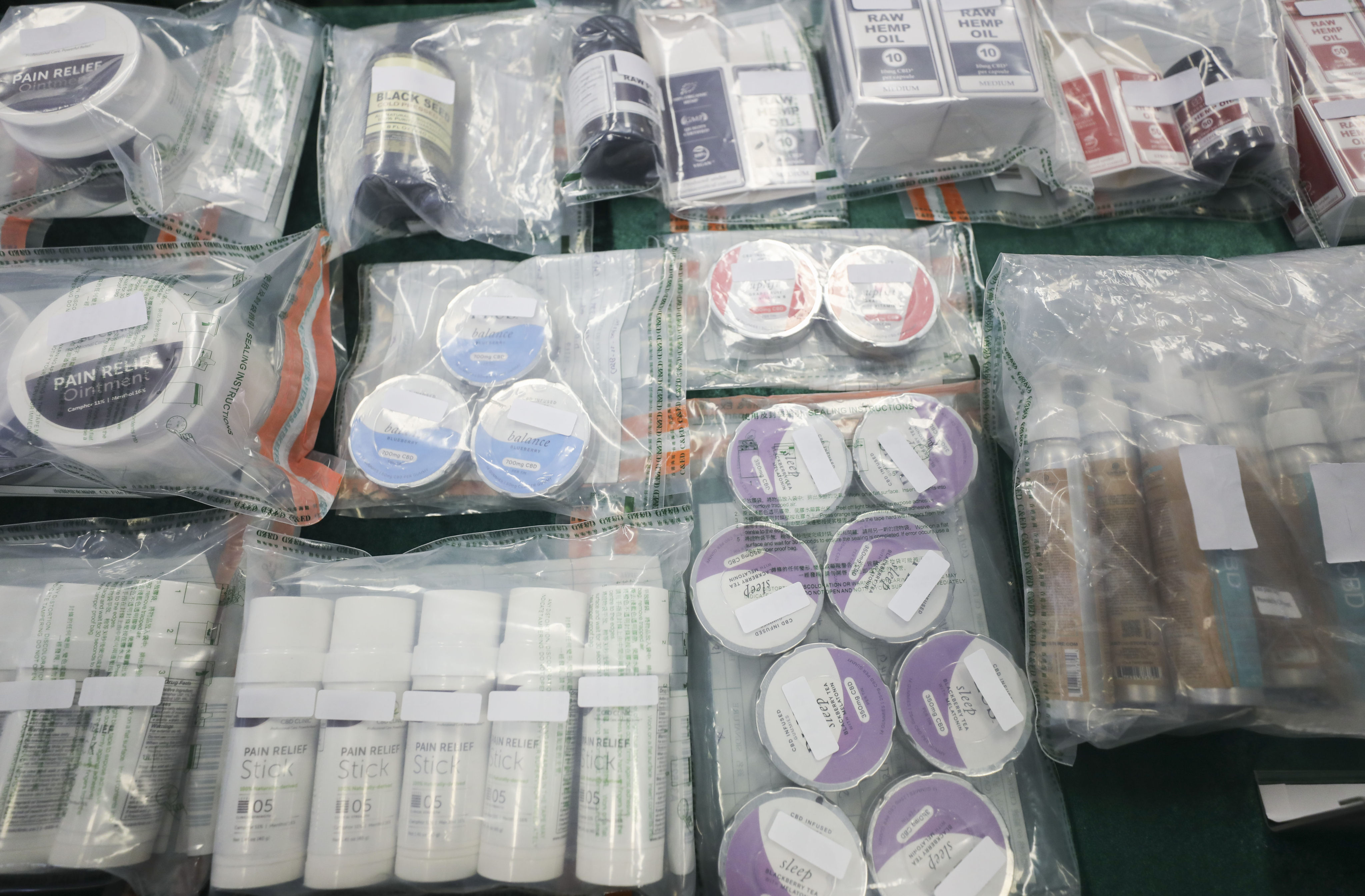Examples of cannabidiol products are displayed at a press conference on January 27, at the headquarters of the Hong Kong Customs and Excise Department in North Point. Photo: Xiaomei Chen