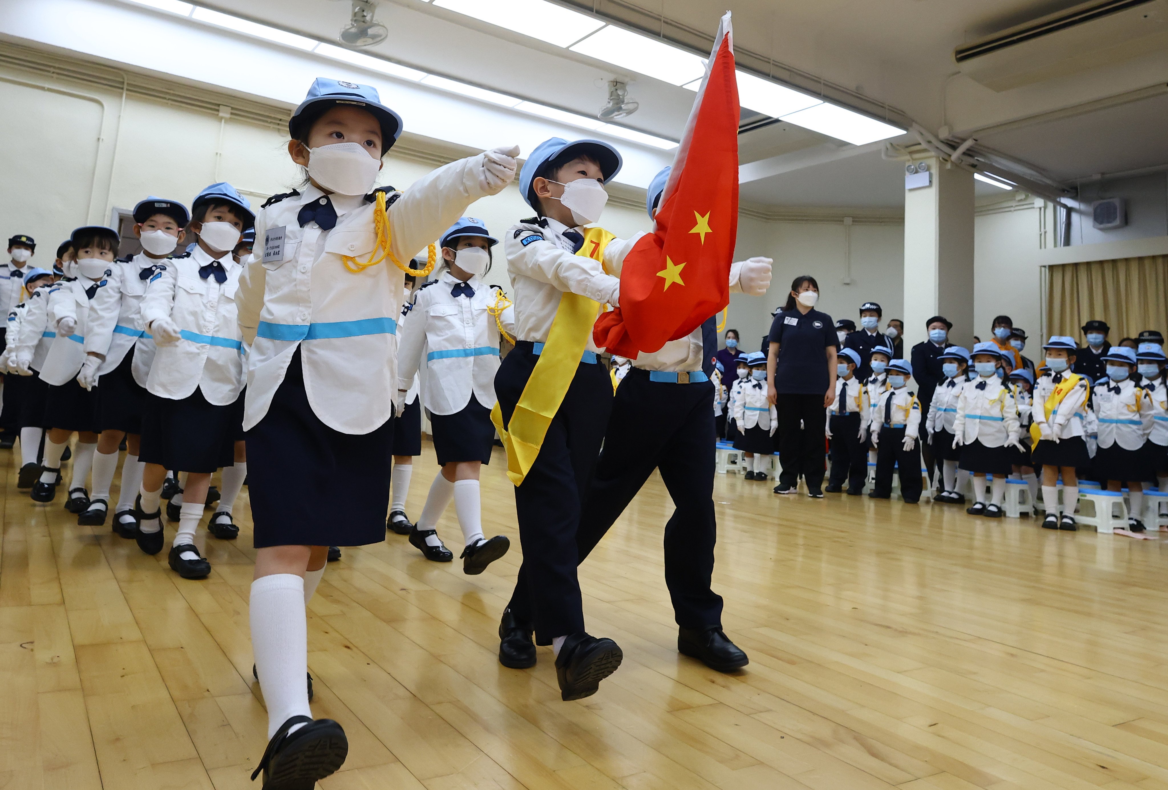 Kindergarten pupils compete in a flag-raising competition at a patriotic education centre in Sha Tin in January 7. Photo: Dickson Lee