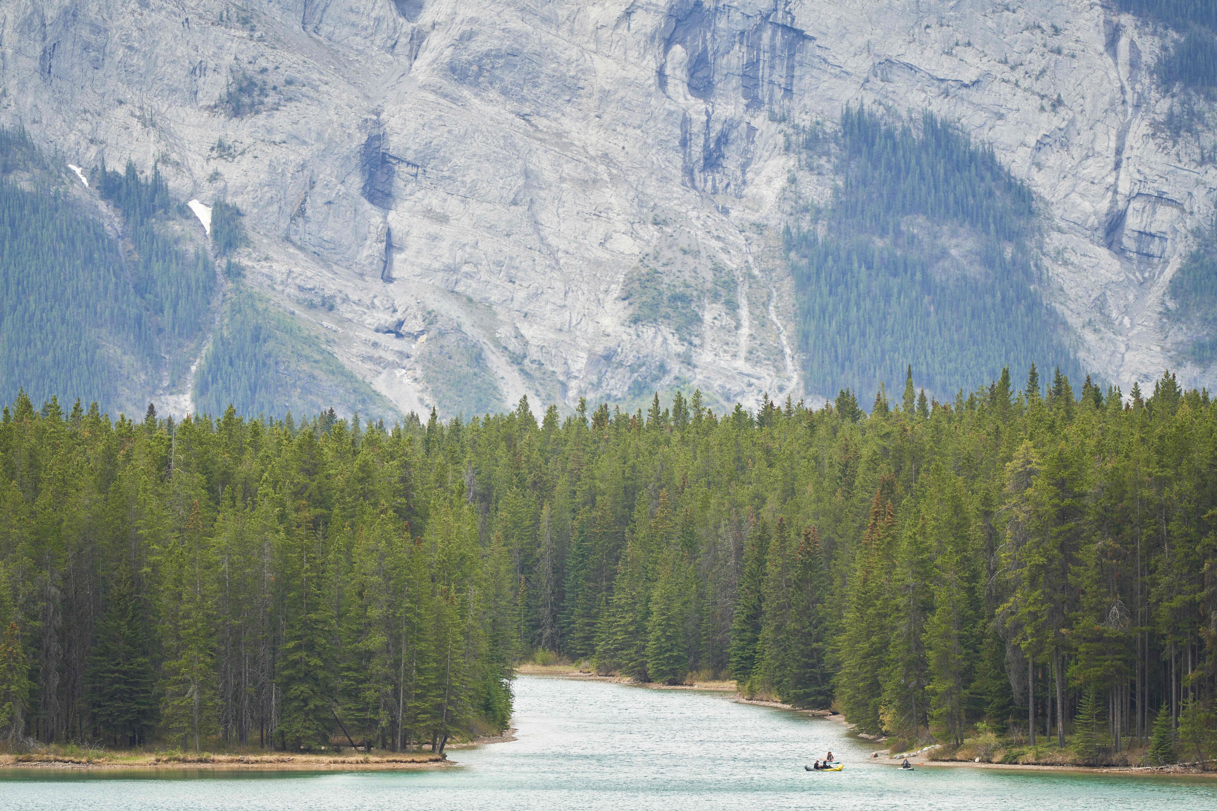 Visitors canoe on Lake Minnewanka in Banff National Park in Alberta, Canada. Photo: AFP