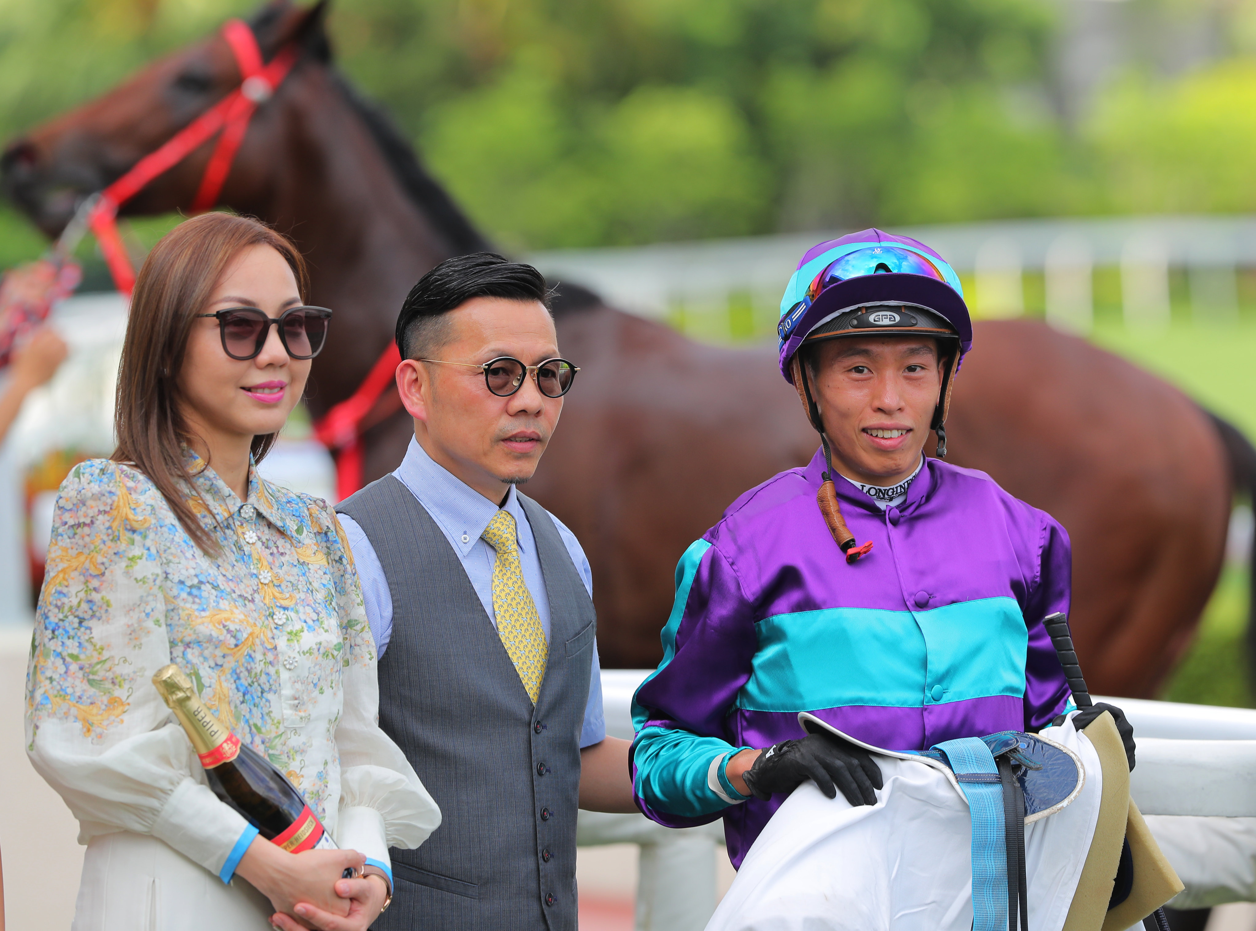 Frankie Lor (centre) celebrates Dream Winner’s Class Three victory over 1,000m at Sha Tin on June 10. Photo: Kenneth Chan
