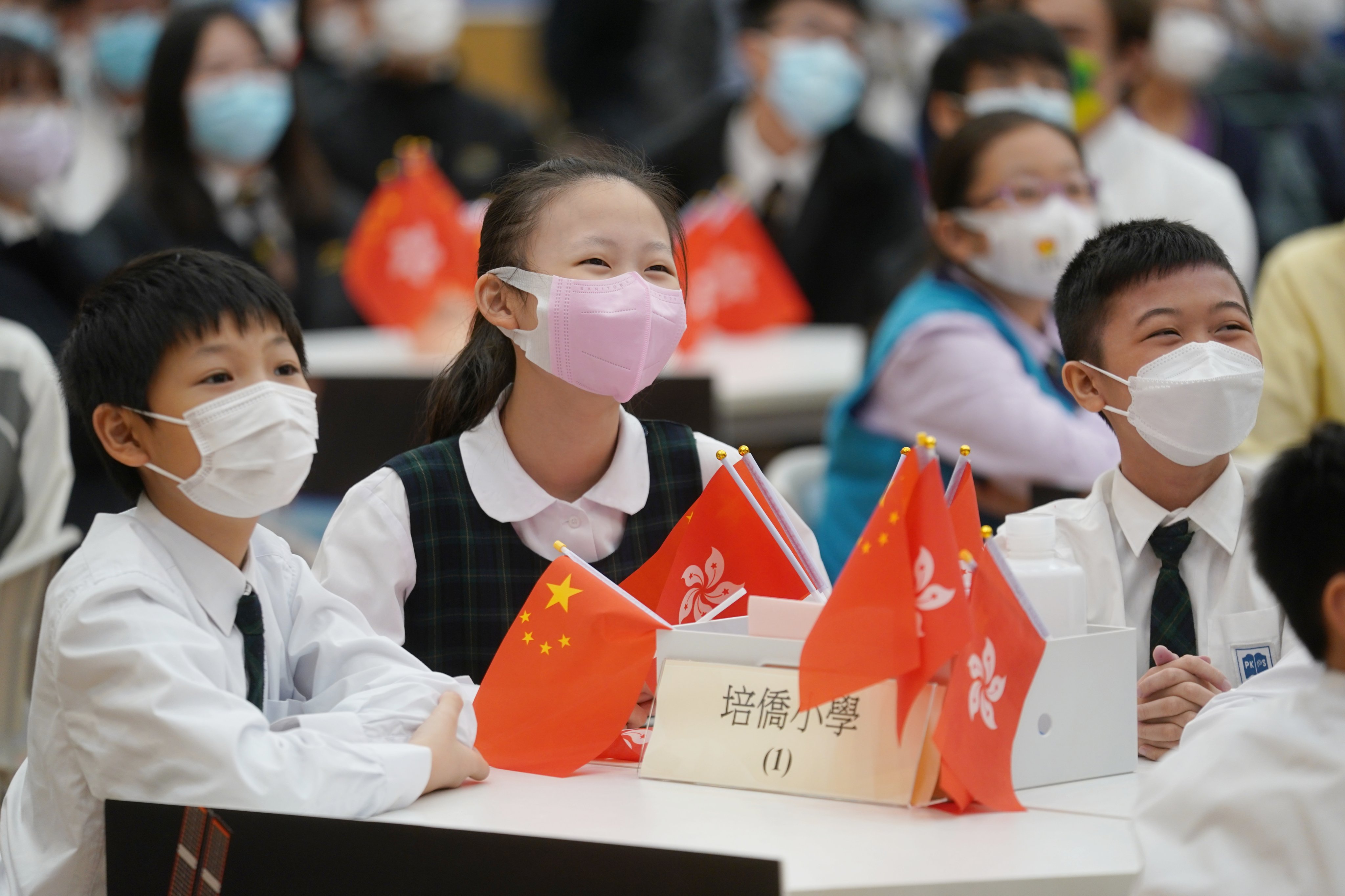 Hong Kong students attend a talk given by three taikonauts, at a school in Hong Kong in December 2021. Of the many reasons to promote the space sector, perhaps the most powerful one is that the wonders of outer space make our children’s eyes shine. Photo: Xinhua