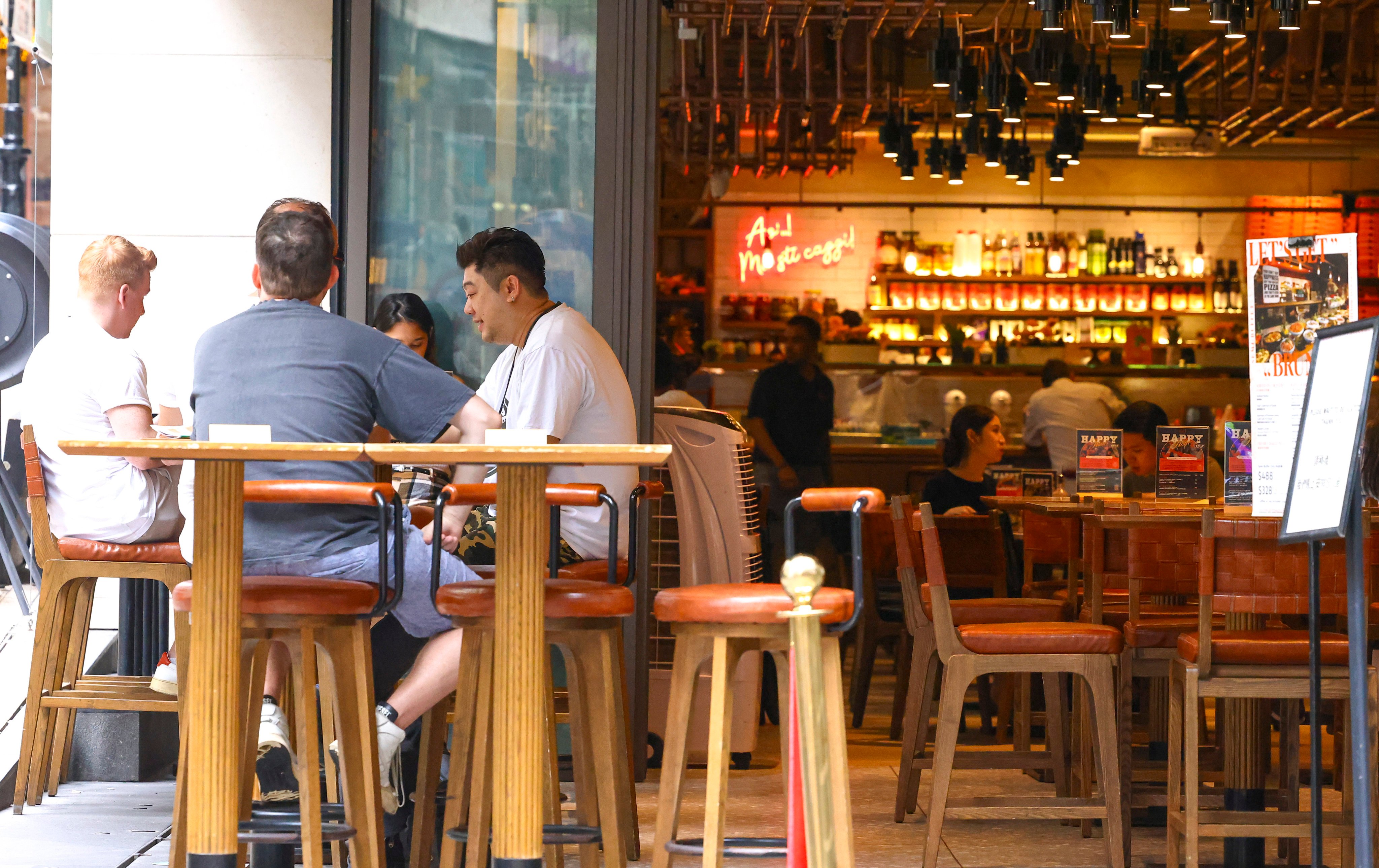 Italian restaurant Baci in Lan Kwai Fong slashed 29 per cent off its HK$188 and HK$98 packages for free-flow drinks as part of the celebrations. Photo: Dickson Lee