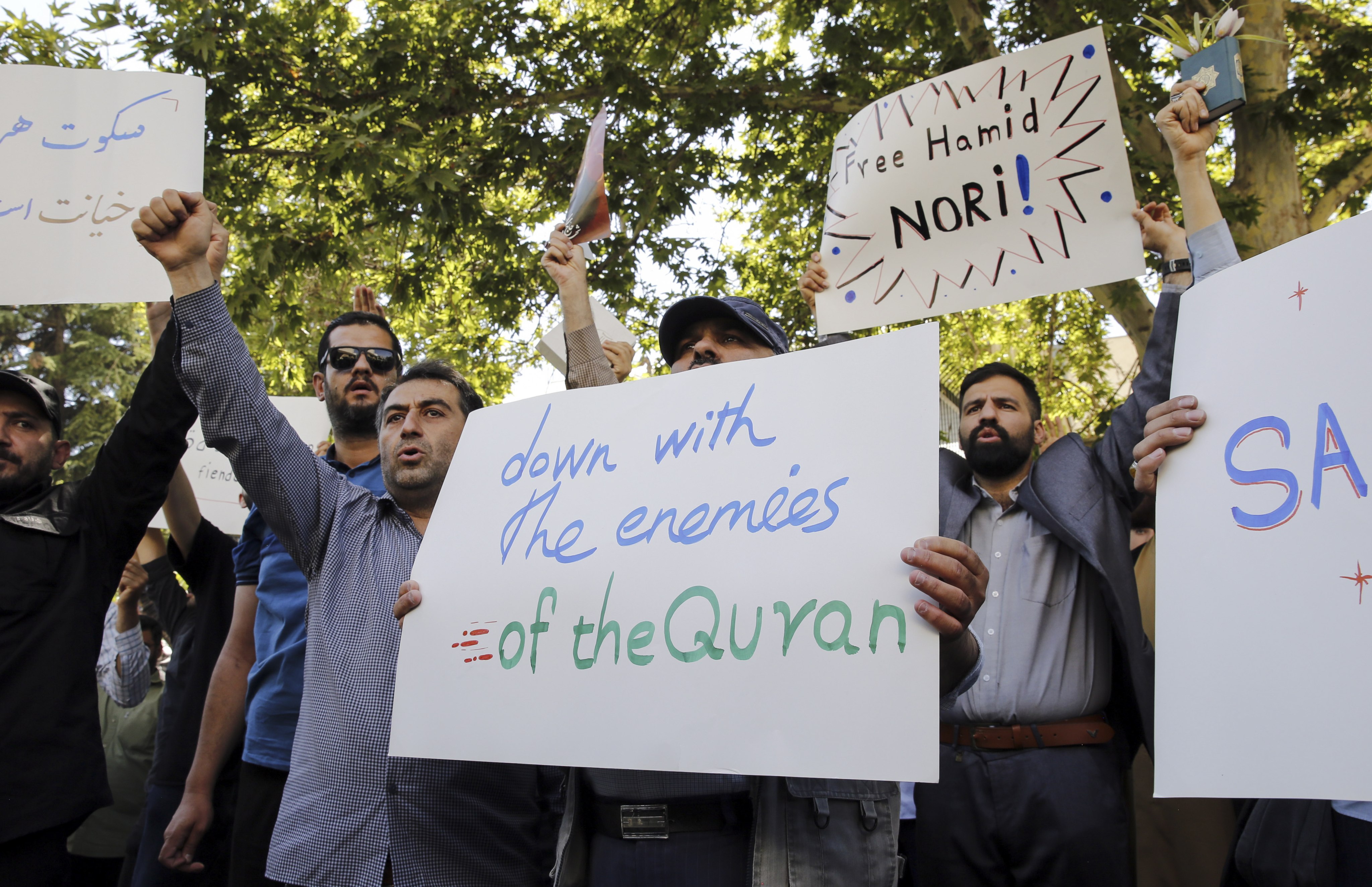 Iranian demonstrators shout slogans in front of the Swedish embassy in Tehran on June 30. Photo: EPA-EFE