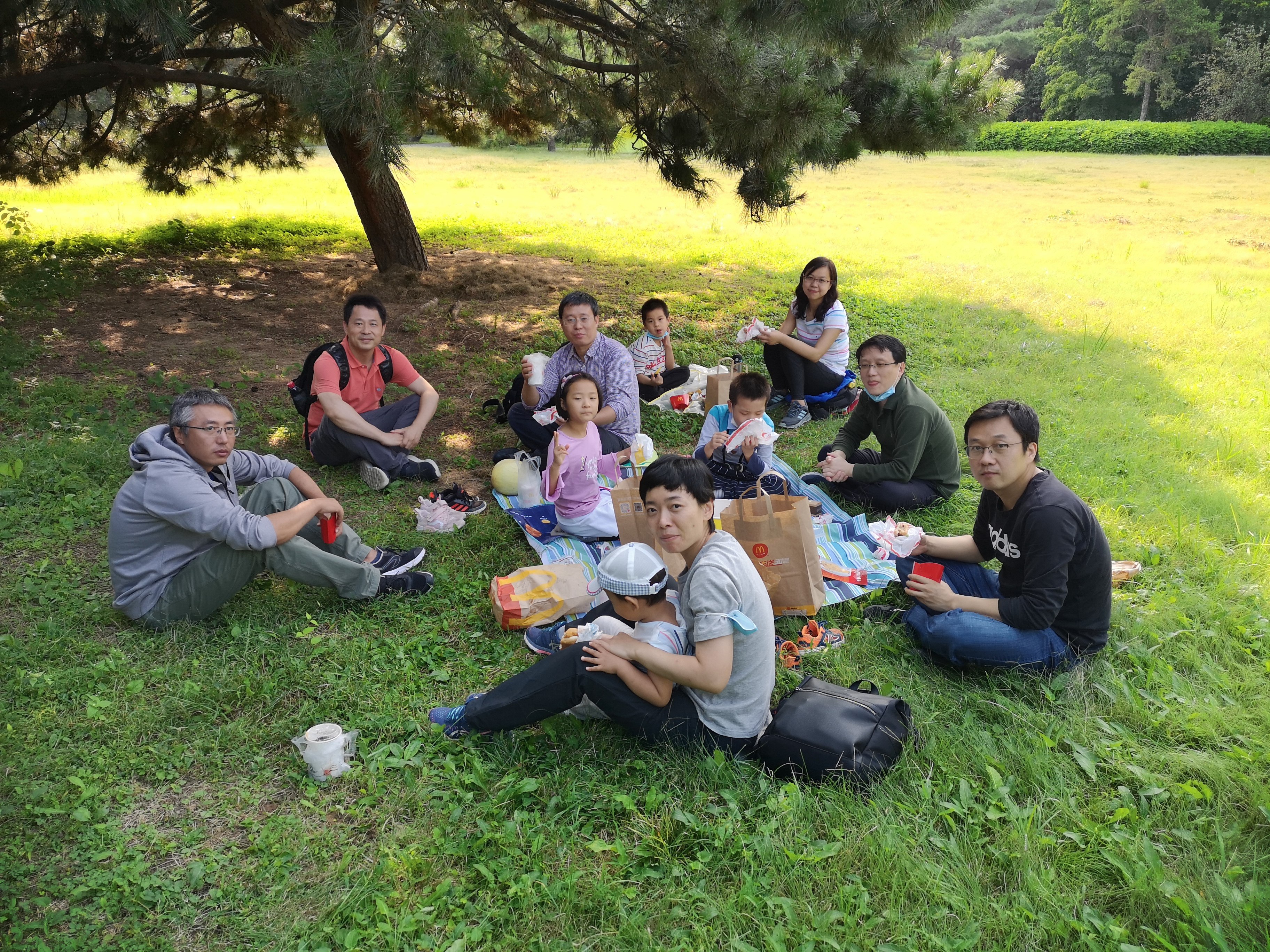 Some of the young scientists who founded The Innovation science journal in China enjoy a day out with their families. Photo: Handout