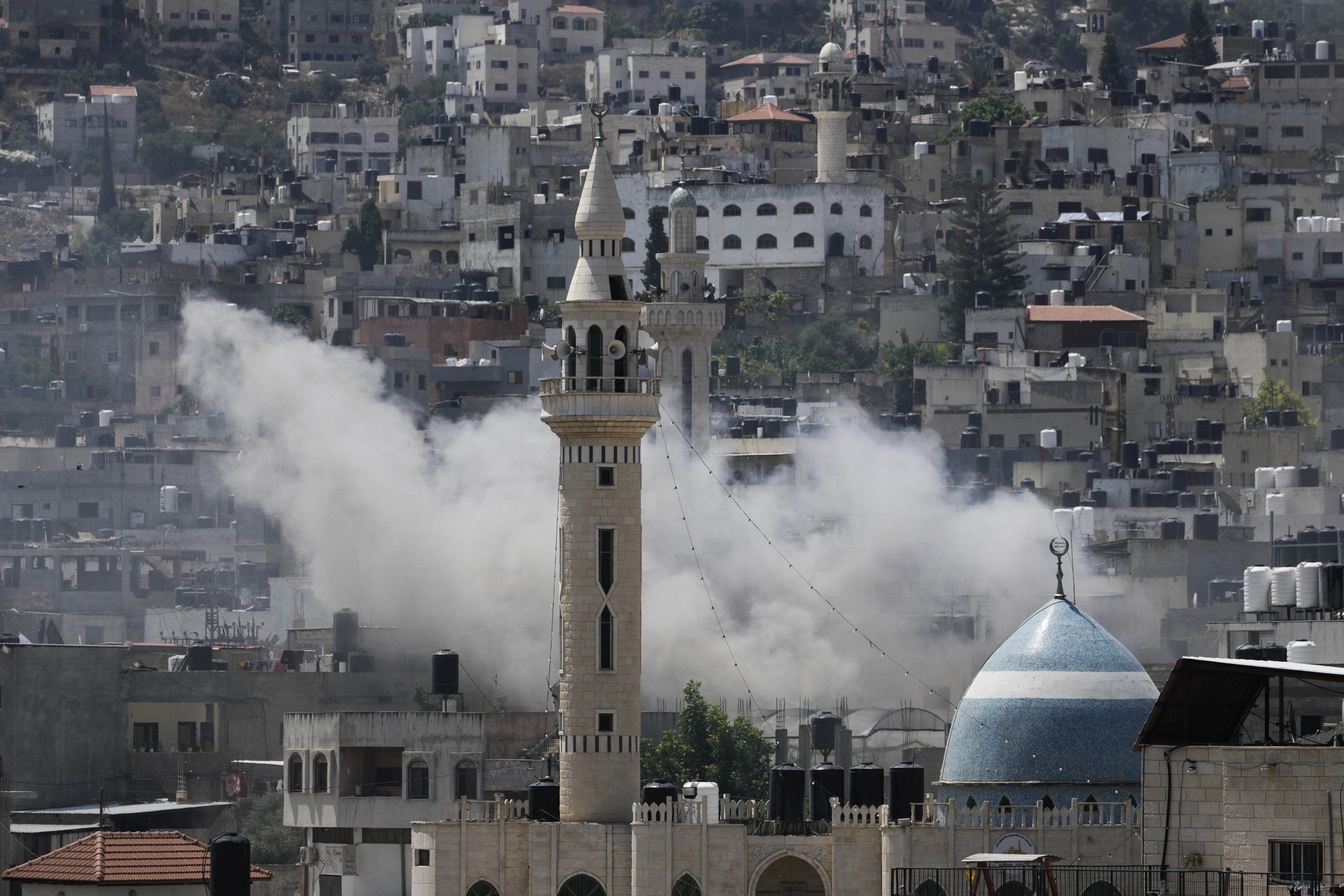 Smoke rises during an Israeli military operation in Jenin, in the Israeli-occupied West Bank. Photo: Associated Press
