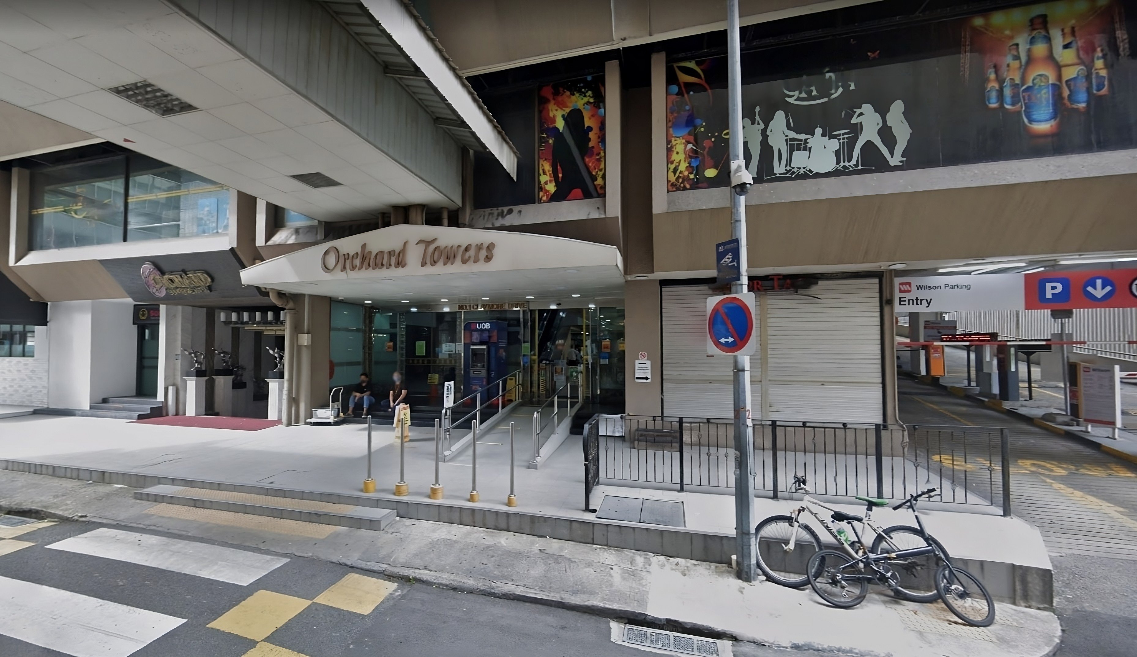 An entrance to Orchard Towers in Singapore. The building is now being transformed into another neighbourhood shopping centre. Photo: Google