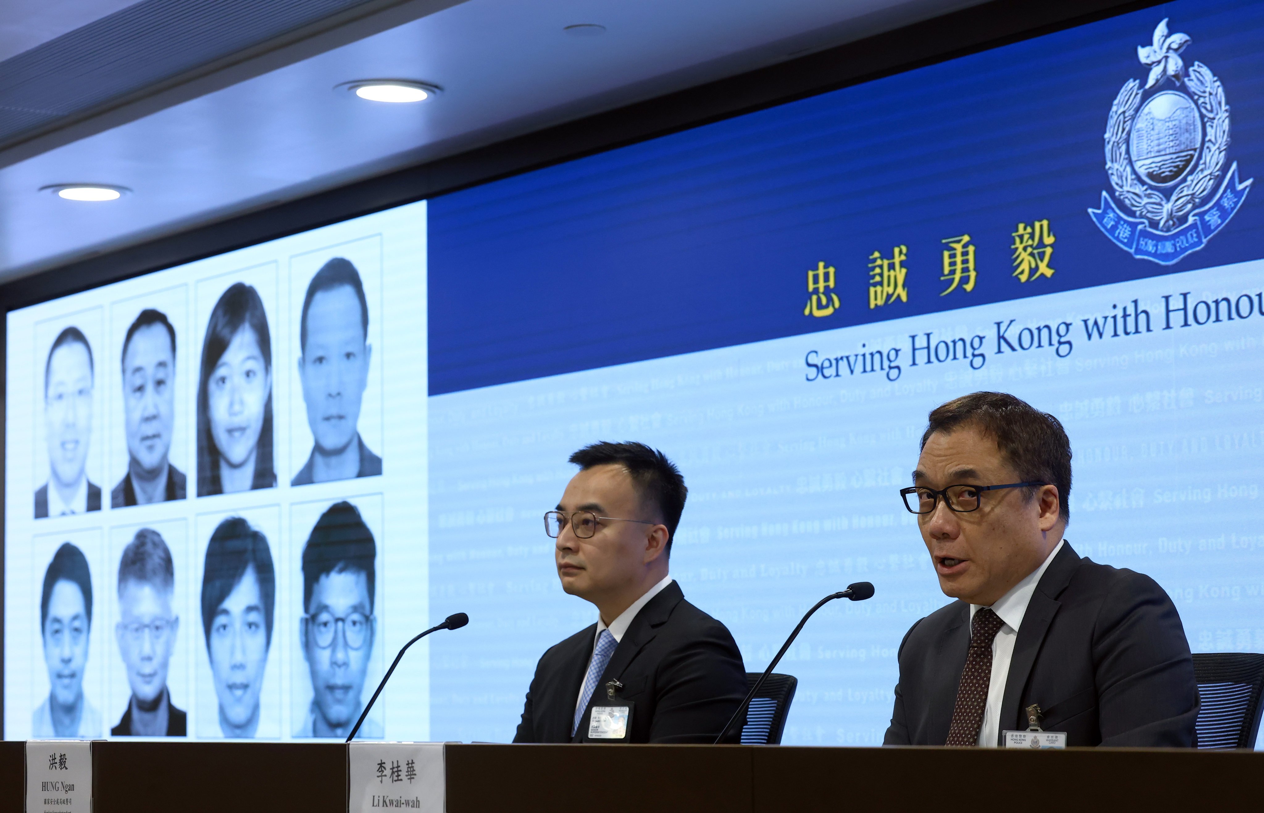 Police display the faces of eight suspects wanted under the national security law. Photo: Dickson Lee