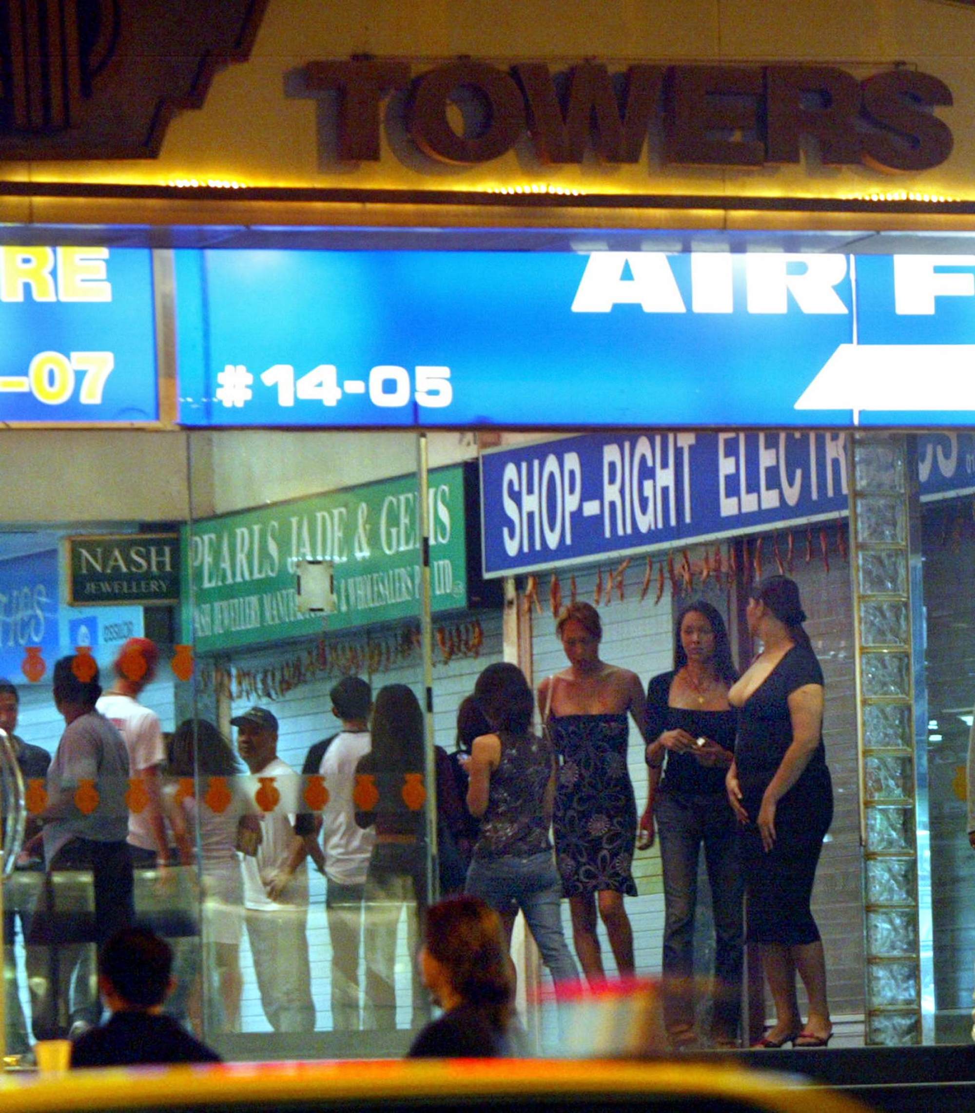 A file photo from 2004 shows the entrance to a building along Singapore’s Orchard Road where foreign sex workers looked for customers in nightclubs. Photo: AFP
