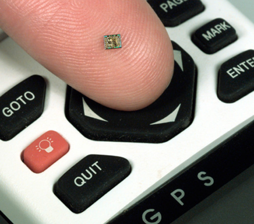 A silicon germanium chip is displayed on a finger to show its size. Photo: Handout