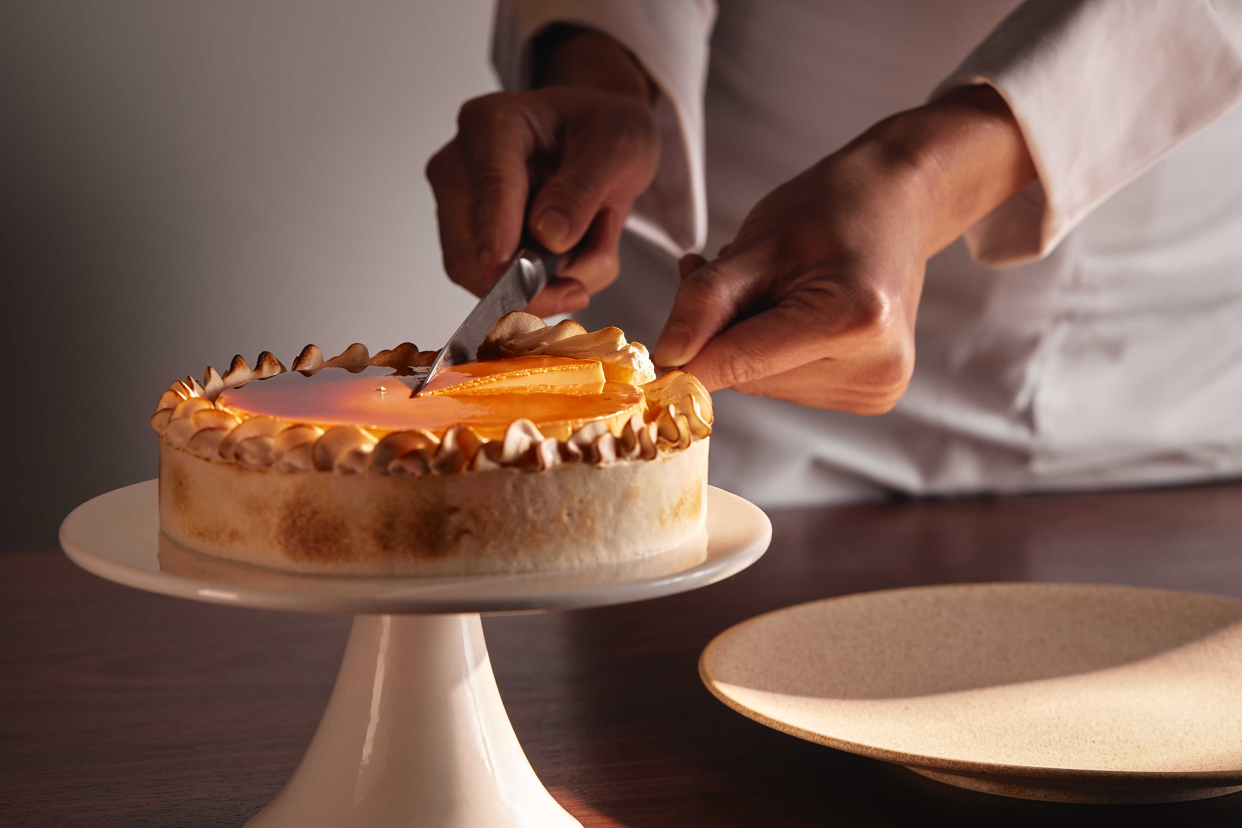 New Hong Kong cake shop Otera’s signature banana whiskey flan with candied walnut. Other desserts available include a soy sauce caramel flan. Photo: Otera