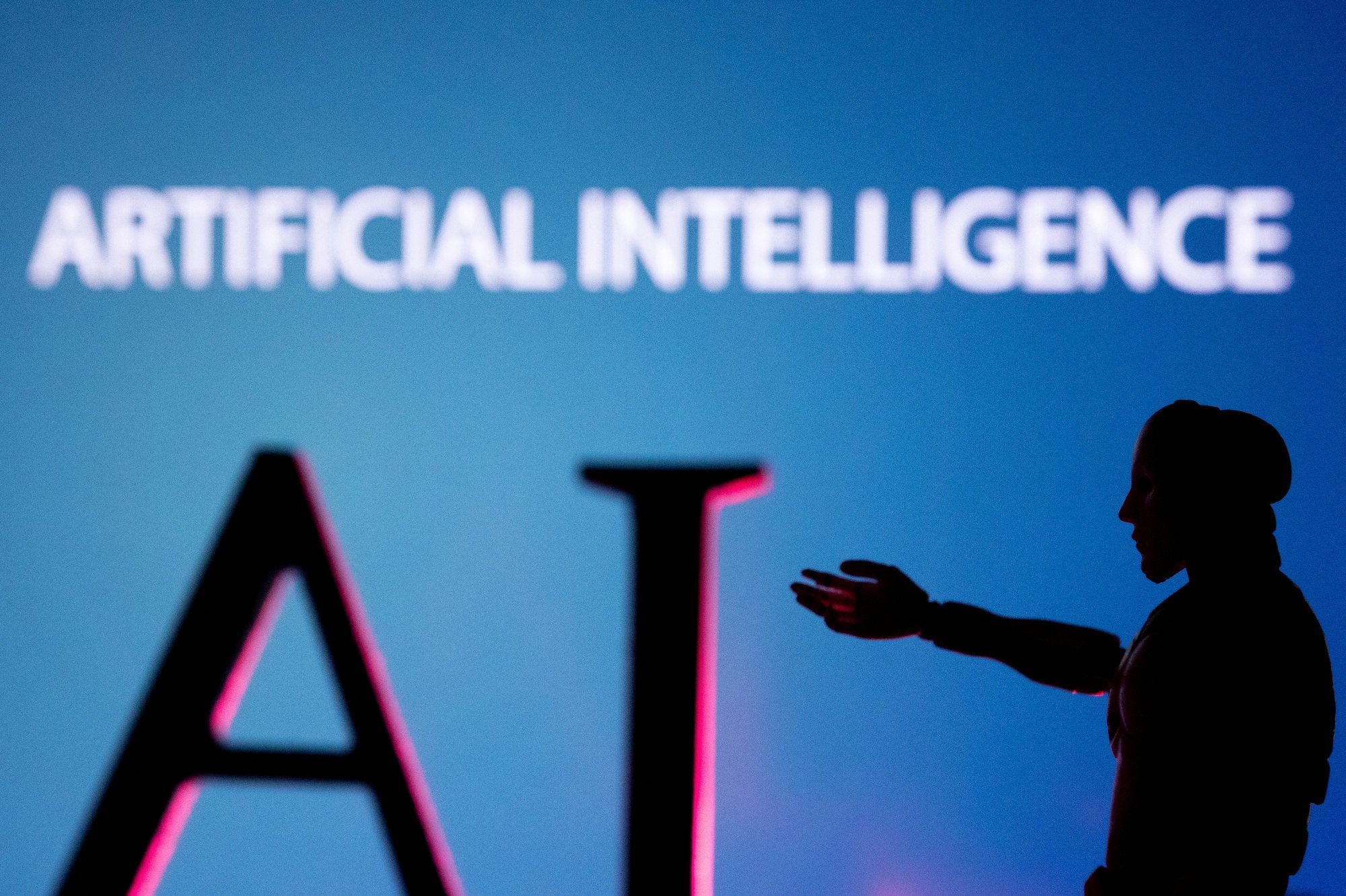 The letters for AI (artificial intelligence) and a robot figure are seen in this illustration taken June 23, 2023. Photo: Reuters