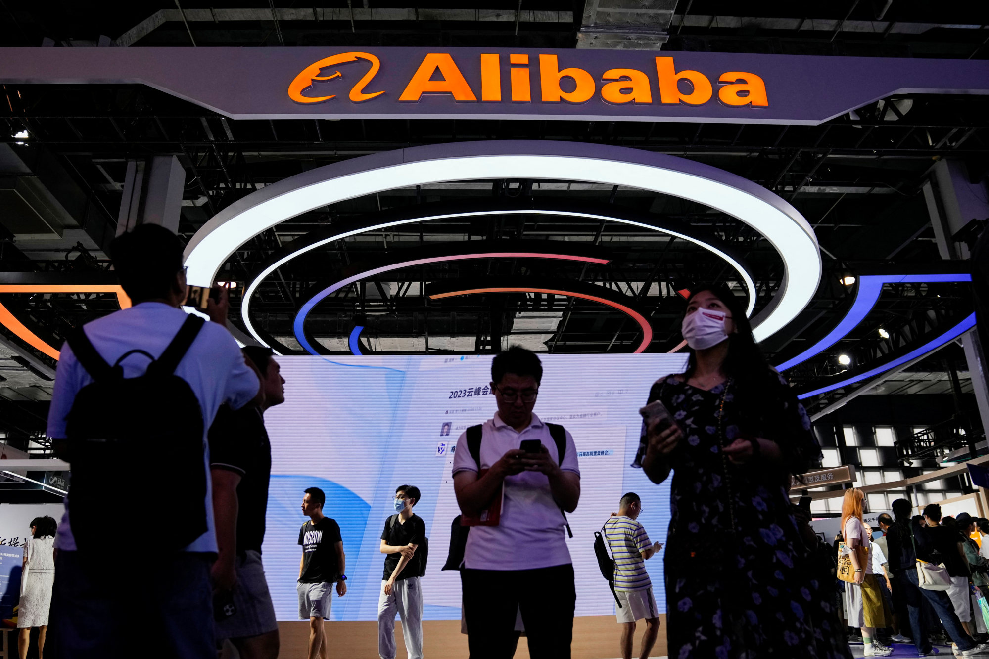 People visit the booth of Alibaba Group Holding at the opening of the World Artificial Intelligence Conference in Shanghai on July 6, 2023. The e-commerce giant is part of a special task force that will draw up a national standard for large language models. Photo: Reuters