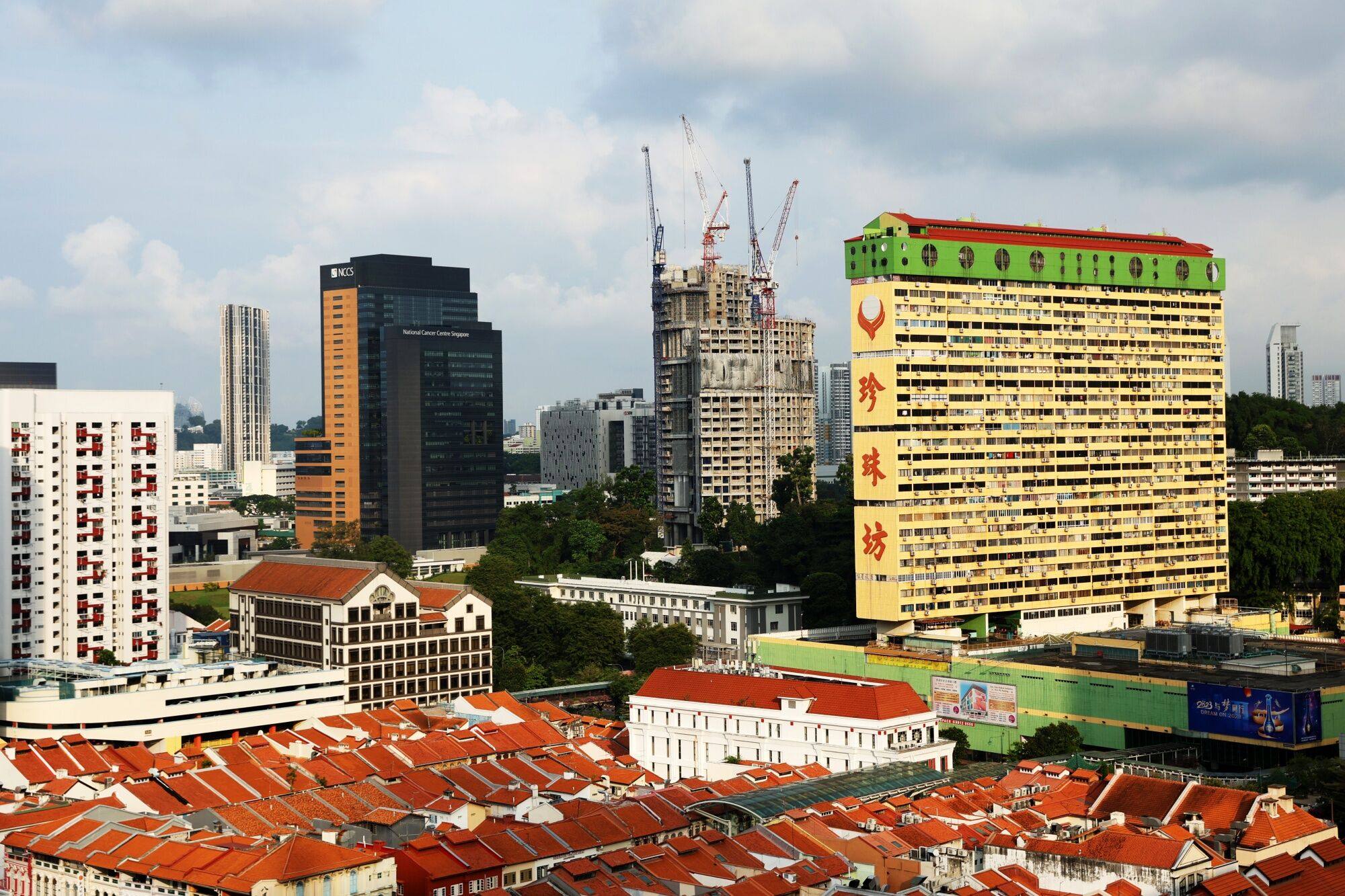 The One Pearl Bank residential project, center back, at Outram-Chinatown precinct in Singapore, on Sunday, June 4, 2023. The government reiterated it expects 40,000 home completions this year – the highest in the last five years – and about 100,000 by 2025. Photo: Bloomberg