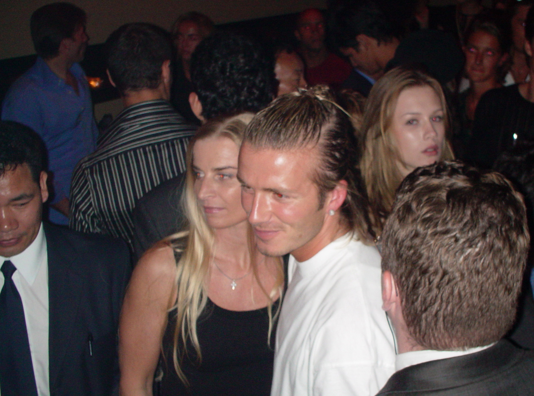 Footballer David Beckham is surrounded by beauties and bodyguards at a party in Dragon-i in August 2003. Photo: SCMP