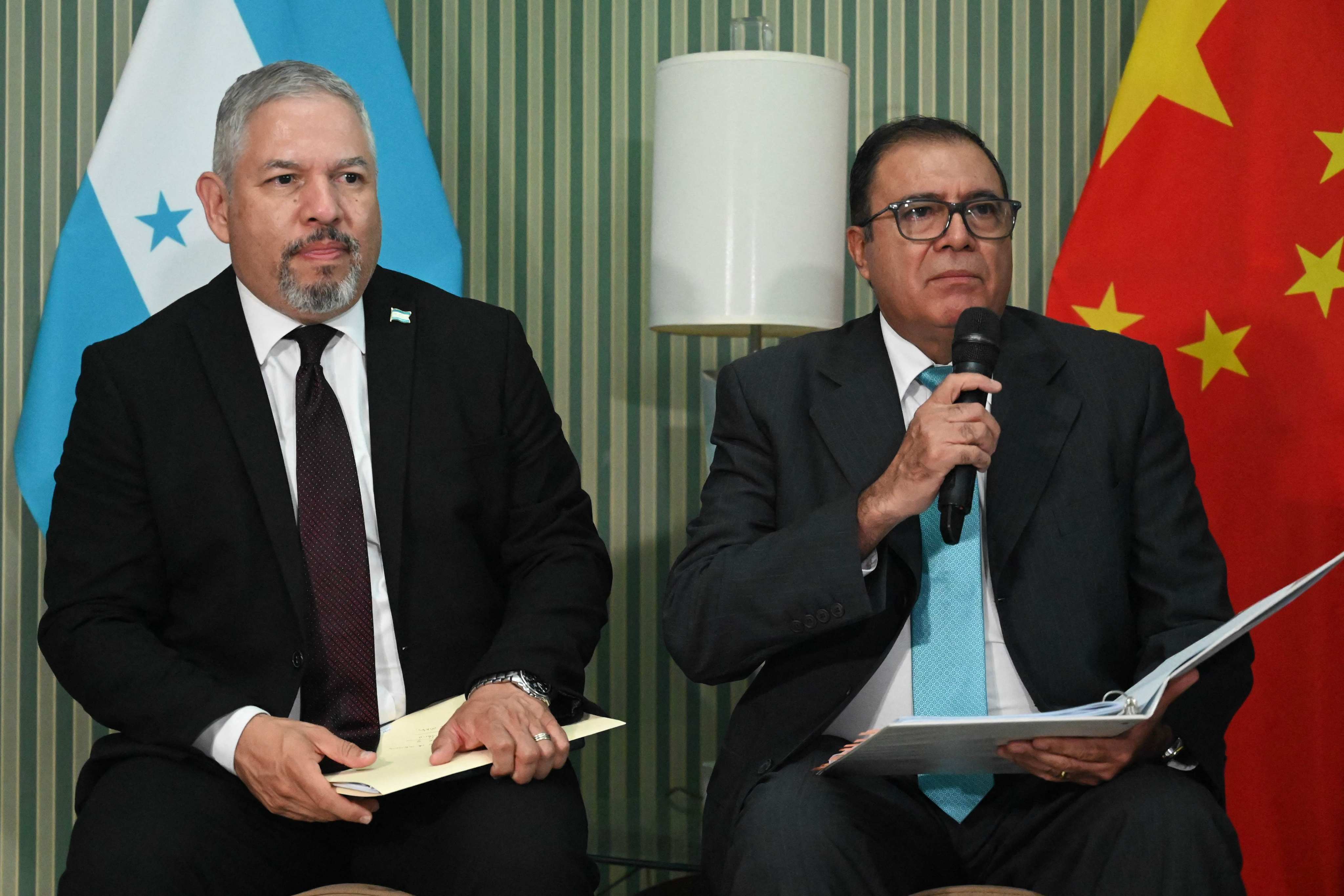 Honduran foreign minister Eduardo Reina, left, and economic development minister Fredis Cerrato in Tegucigalpa, Honduras on Friday. Photo: AFP