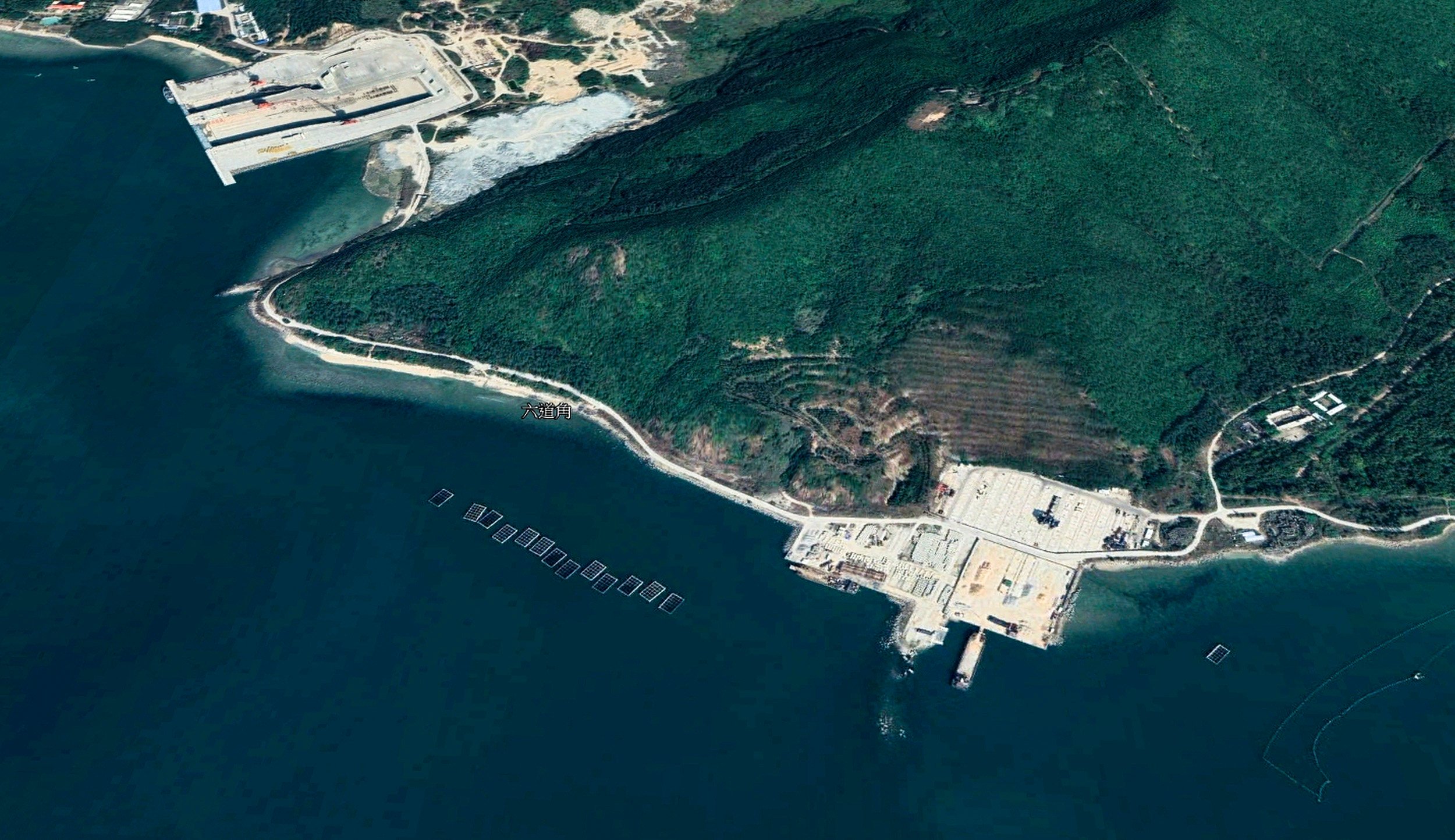 Satellite imagery of the Yulin naval base at Sanya in southern China shows new construction and expansion projects have started in the past year. Source: Google Earth